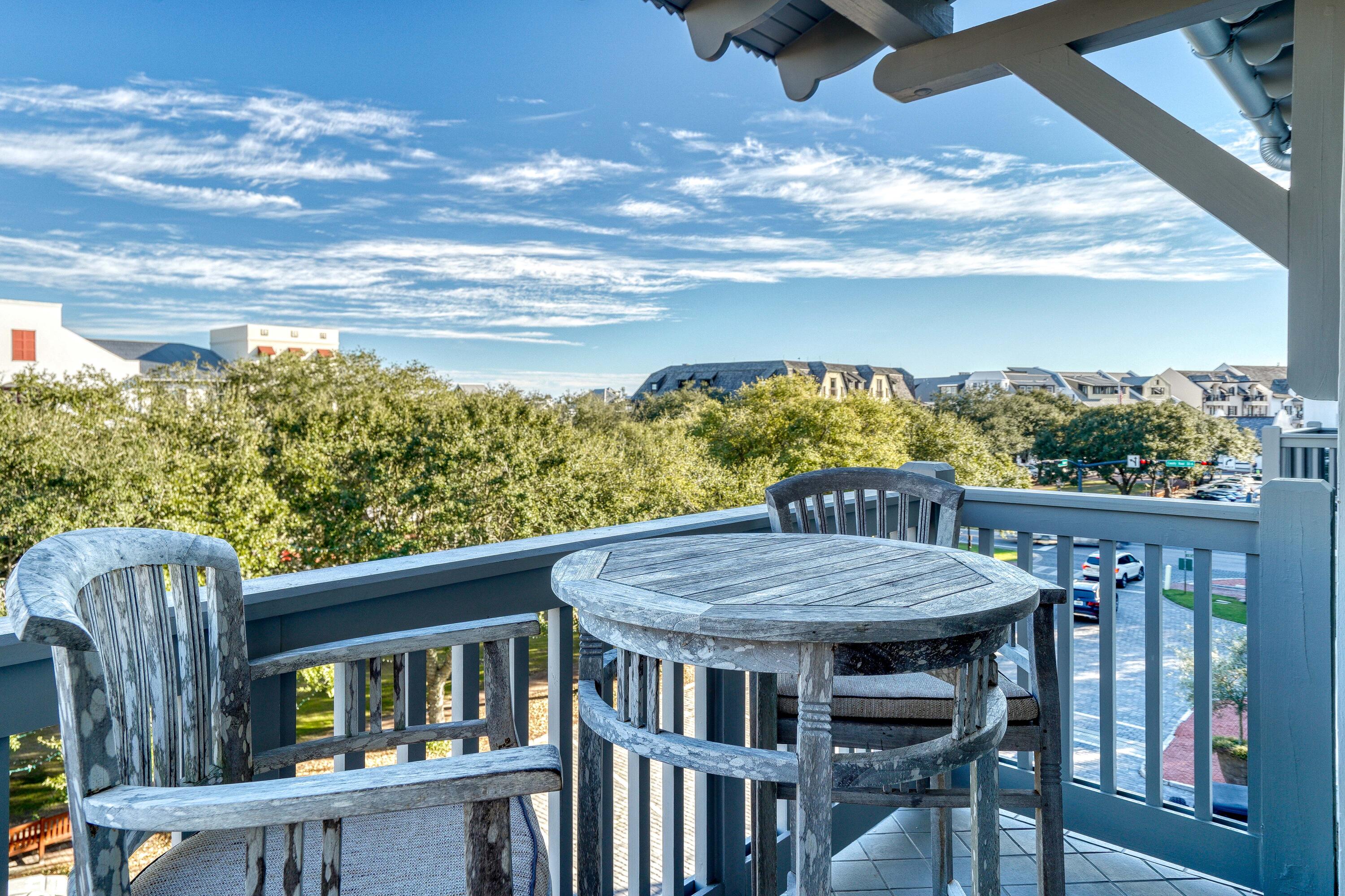 Situated in the desirable Lofts West complex, with views across the Rosemary Beach town center, this penthouse residence encompasses over 1,200 square feet of thoughtfully designed and freshly updated living space. Upon entry you are greeted by the spacious living area featuring soaring 20' vaulted ceilings and stunning hardwood floors. The Chef's kitchen encompasses a luxury appliance suite, glass mosaic backsplash, quartz countertops, and custom cabinetry. Perfect for entertaining, the dining area conveniently abuts to the kitchen and provides accommodations for eight in addition to the breakfast bar seating. The balcony located off of the living area is the perfect place to unwind and admire the ever-changing idyllic palate of vibrant color and majestic glow exuded from the renowned Emerald Coast sunsets each and every night.

Overlooking the town center, the main suite provides a true retreat with the accompanying spa-like ensuite boasting double vanities, a custom tiled shower, soaking tub, and ample built-in storage. Affording additional privacy, the guest bedroom and bathroom are ideally positioned off of the main entry hall. The articulated coastal-chic design is further exemplified with the high-end finishes and impressive Tommy Crow artwork found throughout the residence.  

Abundant community amenities include a fitness center, playground , deeded beach access, and multiple community pools . Enjoy the famed Rosemary Beach community events hosted throughout the year including live concert performances, movie nights, festivals, and weekly Farmer's Markets. Barrett Square is also geographically poised minutes from all of the world-class dining, shopping, and entertainment venues 30A has to offer. Impressive rental potential coupled with the upmost level of luxury often only found in primary residences creates a compelling opportunity for investors and full-time residents alike. Inquire today to schedule a private viewing and discover why Rosemary Beach remains one of the most sought after communities along 30A.