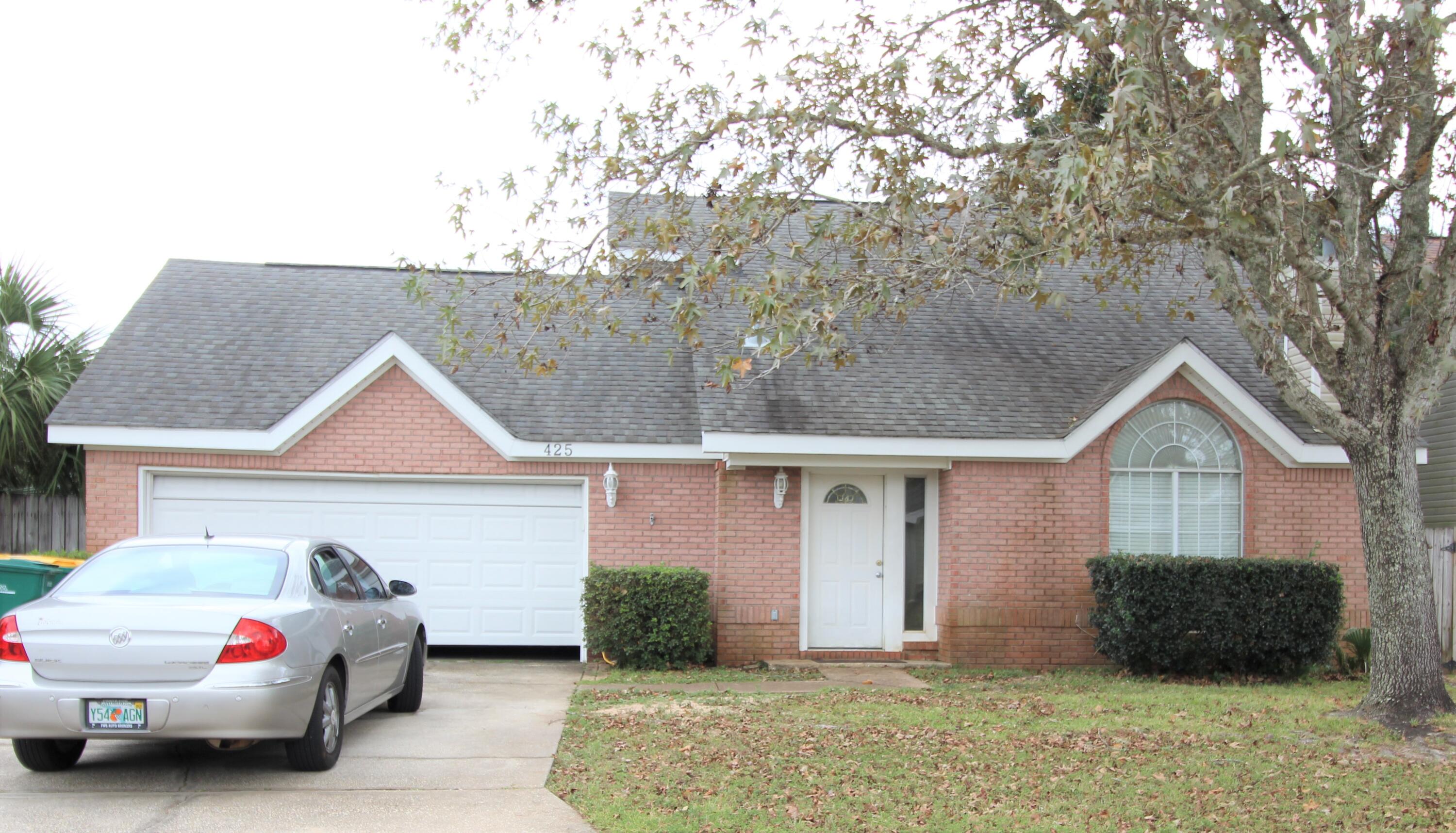 Within minutes of Hurlburt Field AFB!!! This charming 3 bedrooms and 2 baths; 2 story home offers open and airy floor plan with ceramic tile in kitchen and master bedroom. Master bedroom downstairs, third bedroom upstairs overlooks the family room. Cozy wood burning fireplace in living room and cathedral ceiling. 2 car garage with fenced back yard. Great location short distance to the beaches, and shopping centers. HVAC was replaced in Jan 2019, Garage Door in 2015 and all kitchen appliances in 2018.  Buyer to verify SF.