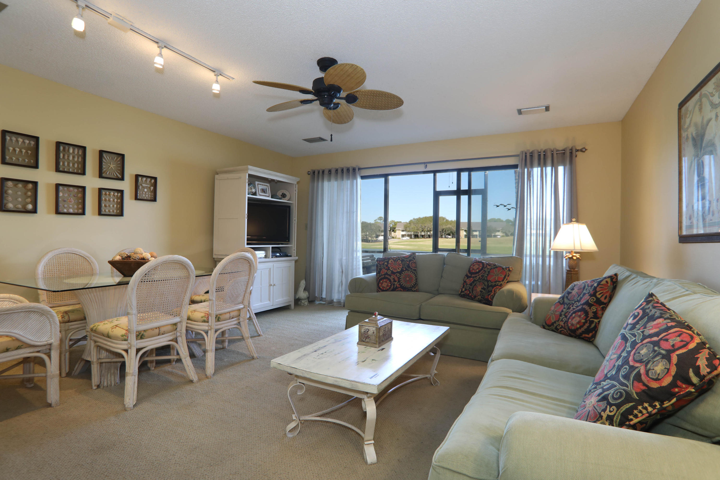 ONLY 2BR/2BA unit available in Seascape's coveted Lakefront area.Terrific ground floor garden unit is about fifty steps to the beach access, twenty steps to the pool, and you can walk out your screened-in patio and fish in a freshwater lake. A wonderful rental unit, there are no steps to negotiate, and both bedrooms have attached baths. Massive MBR and bath has separate vanity and shower areas. Expanded kitchen with dining bar, dining room space for six, and comfortable living room seating make the condo a great second home or a popular rental property. Priced to allow you room to renovate. Close before summer and generate $12K-$15K in summer rental revenue.