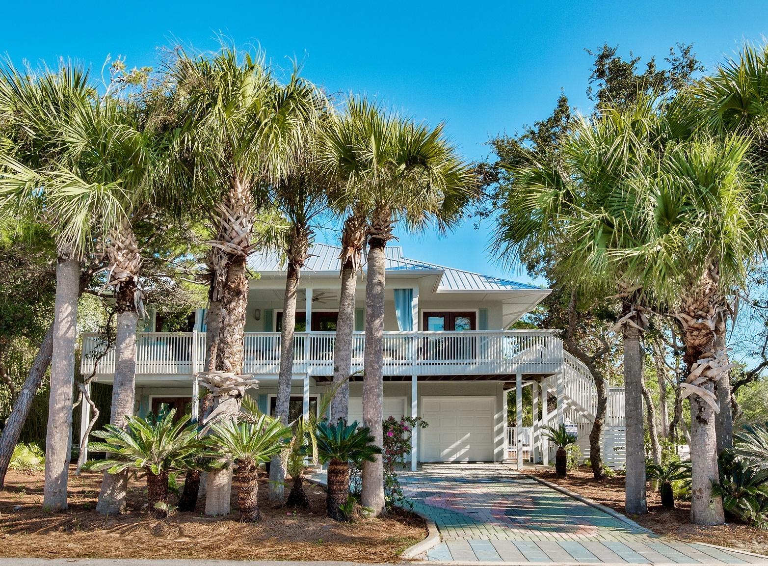 WELCOME HOME to your DREAM Beach oasis! From the moment you step into this newly renovated masterpiece, that has been completely redesigned for maximum comfort and beauty, you will feel at home. Just like new, from the new roof, 'LifeProof' 100% waterproof core plank flooring in warm wood tones to the new baths, rooms, kitchen, appliances, this home is perfect!
Artfully redesigned to accommodate multi-family retreats, the living areas and spaces for relaxing are remarkable!
Featuring first floor entrance into a very spacious living/dining area with mini kitchen. Elegant full bath. Separate bedroom with private bath, additional bunk room, super fun game room, large laundry for complete living area. Second floor opens to open concept living, doors leading to the very spacious covered and open balcony (46' x 10'). Vaulted beamed 6" V-groove wood ceiling makes the living area the place for entertaining. New kitchen includes 4'x10' white quartz island with Jenn-Air stove, convection oven, decorative glass tile back splash and window overlooking the pool, making the kitchen where everyone will want to be. Adjacent laundry includes extra refrigerator, wine bar and icemaker. Lovely half bath has marble vanity. 2 separate wings for bedrooms give home plenty of privacy.  East master bedroom features king bed and ensuite bath with double quartz vanity and contemporary  tile shower. Double glass doors lead to the spacious balcony. On opposite end of home is an additional suite featuring 2 more bedrooms.  Front queen bedroom has glass doors leading to the balcony.  Rear bedroom features large sitting room encased in windows and decorative shutters overlooking the lushly landscaped back yard and inviting heated pool.  Backyard is made for fun times with quaint Tiki hut, plenty of spaces for lounging by the 38x22 kidney shaped heated pool or just relaxing under the palms.  Multi-level tower has beautiful Gulf views. Front porch is perfect for reading or napping on the day bed or hammock while enjoying outdoor living. Garage is extra large for parking of a car, bikes, golf cart.   Gulf Trace is the most unique of all of 30-A's remarkable communities.  Gulf Trace is a serene private oasis surrounded on three sides by Grayton Beach State Park and fronted by the emerald waters of the Gulf.  This rare and precious community is like an island surrounded by the protected sand dunes, scrub oaks and sea oats to insure privacy and seclusion.  When you are ready for fun, just walk or ride your bike to the wonderful restaurants, shops and entertainment of Grayton Beach. Start living your DREAM where every day is a weekend!  All information deemed correct but should be verified by Buyer.