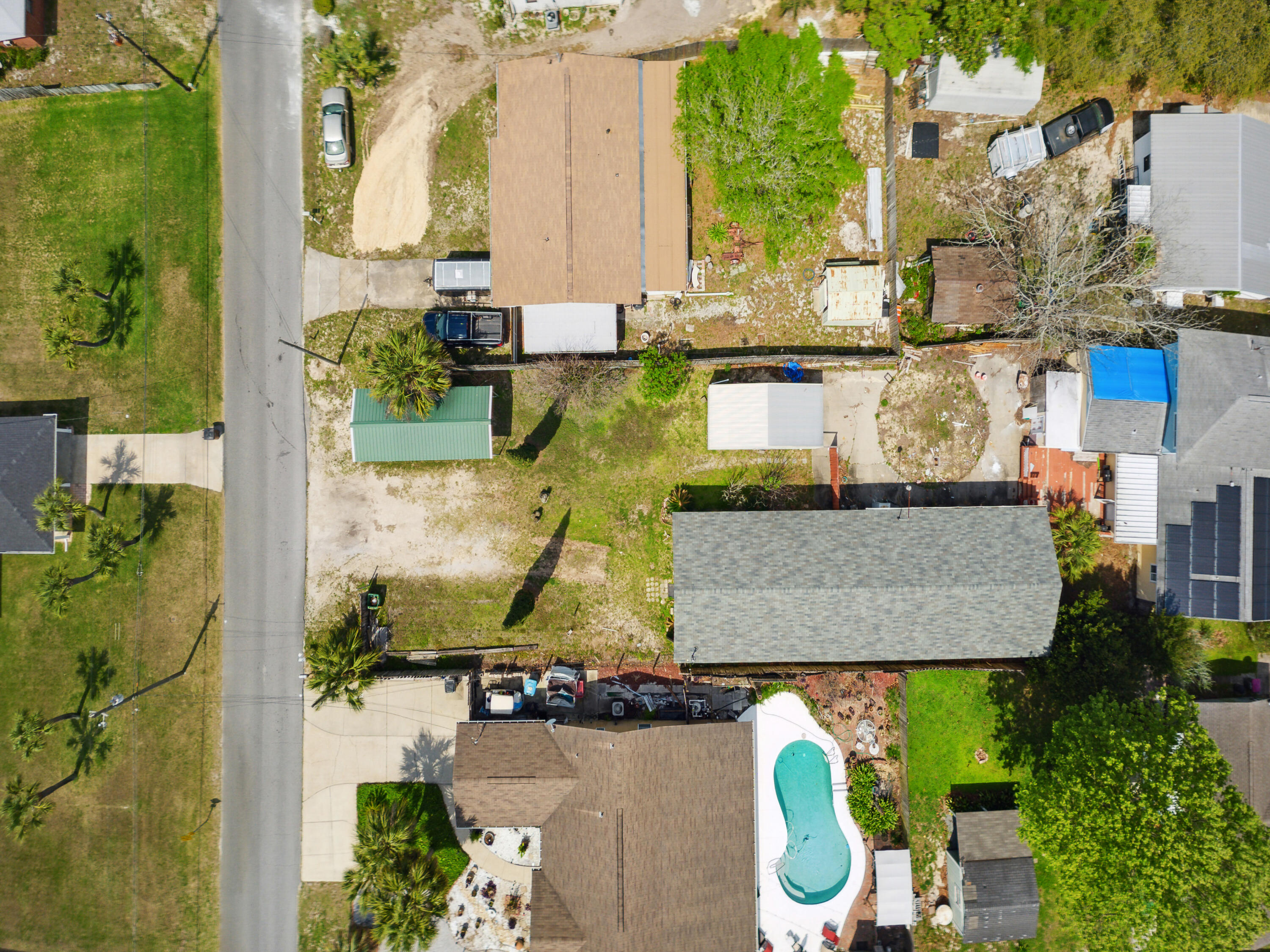 Under contract taking back up offers.  New Investment Alert! Close to the Gulf and new Margaritaville luxury properties!
This unique property presents a rare opportunity for buyers/developers looking to invest in a prime location on the Gulf Coast. Located just minutes from the world-renowned beaches of Panama City Beach, this spacious lot has ample room for development. The property owner will sub-divide from 408 Azalea to meet the specific needs of the buyer, providing flexibility for those looking to create their dream space. One important aspect to note is that there are currently buildings on the property that will need to be removed before sub division/construction can begin.  However, with this minor hurdle out of the way, the buyer will have a blank canvas on which to build their vision. The property's location is a key selling point, offering easy access to the Gulf of Mexico's sparkling waters.
Additionally, it is situated near popular restaurants, shops, and attractions.
Owner is super motivated and willing to work with buyers on sub-division and owner finance terms, this is a rare opportunity not to be missed.