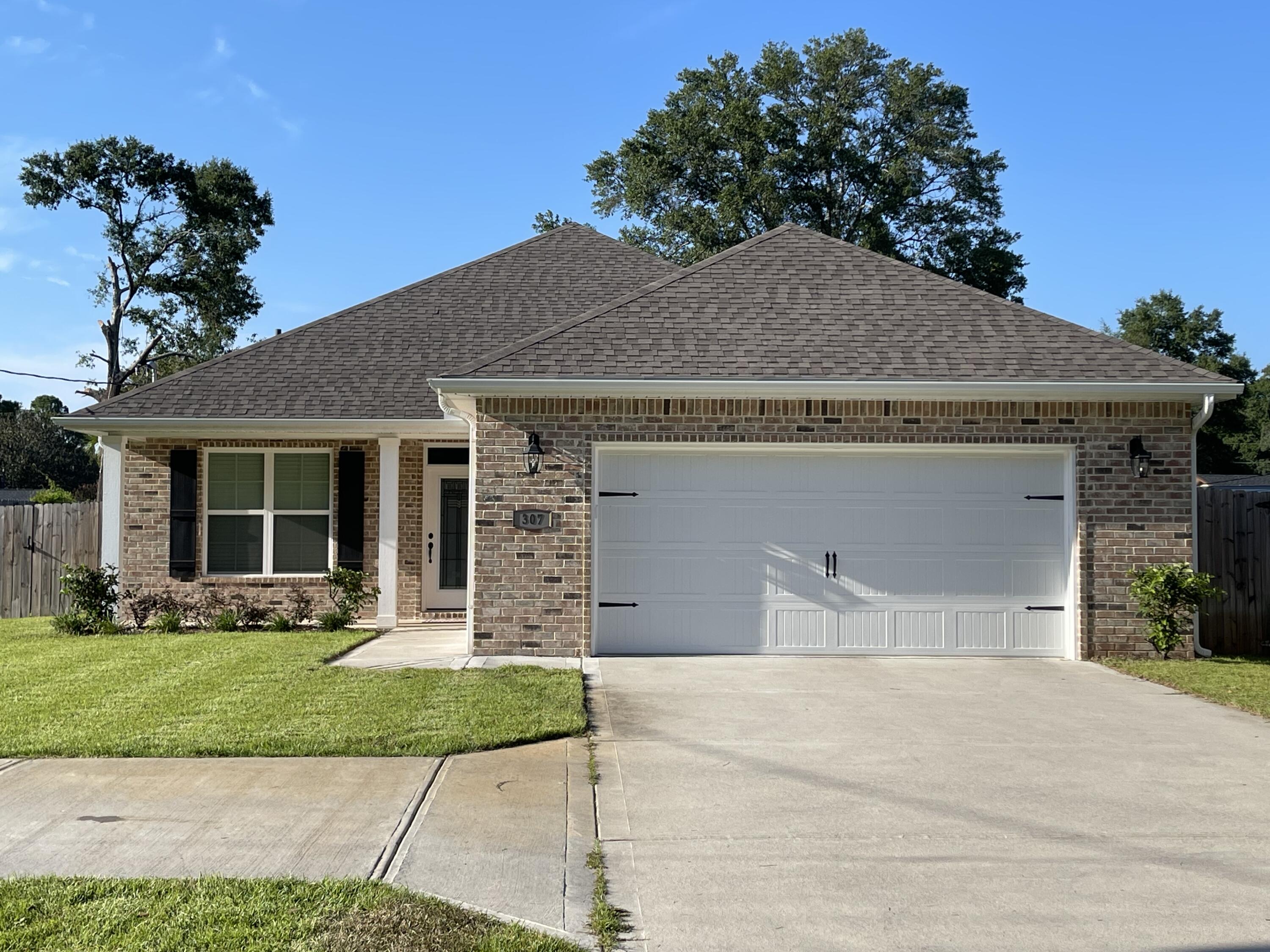 Gorgeous home in central Fort Walton Beach.   4 bedrooms with a split bedroom floor plan for privacy.  Kitchen has granite countertops and island. It is open to the living room/dining room combo. Wood plank tile throughout with carpet in bedrooms.  Master bedroom is spacious and has 9 foot ceilings . Master bath has garden tub with large walk in shower.  Large privacy fenced back yard.  Lawn pump and sprinkler system.  No pets allowed and no smoking or vaping in home or garage.