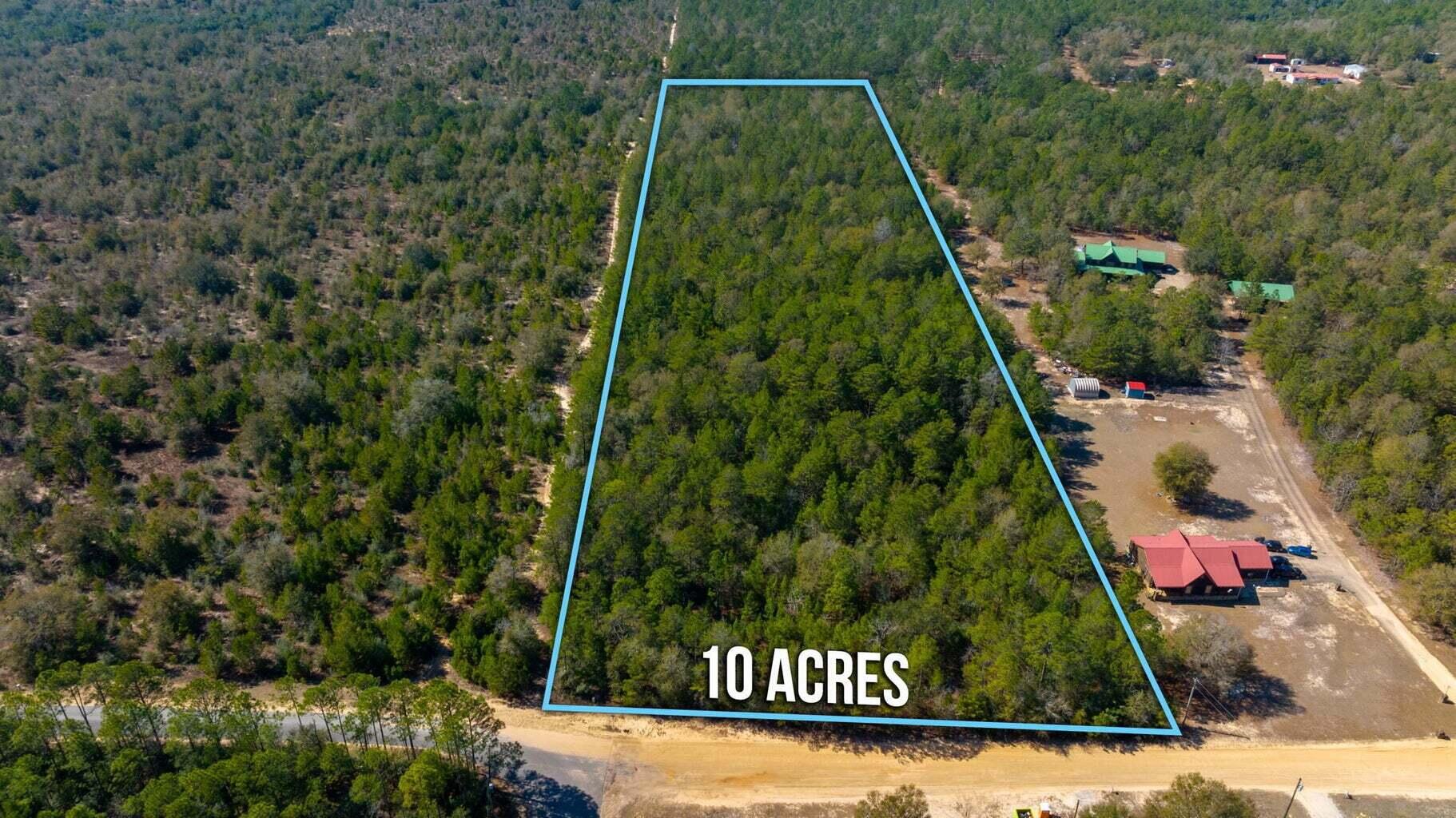 ACREAGE!! Fantastic 10 acre mostly wooded parcel within minutes to I-10, Crestview or Defuniak Springs. The parcel is located at the edge of a paved road, so no long track down a dirt road is required. Bring your house plans and start get started on making your dreams a reality! Since these aerials were taken - there has been a section of the property that's been cleared (area believed to be approximately 3 acres).  Buyer to verify all areas of importance!