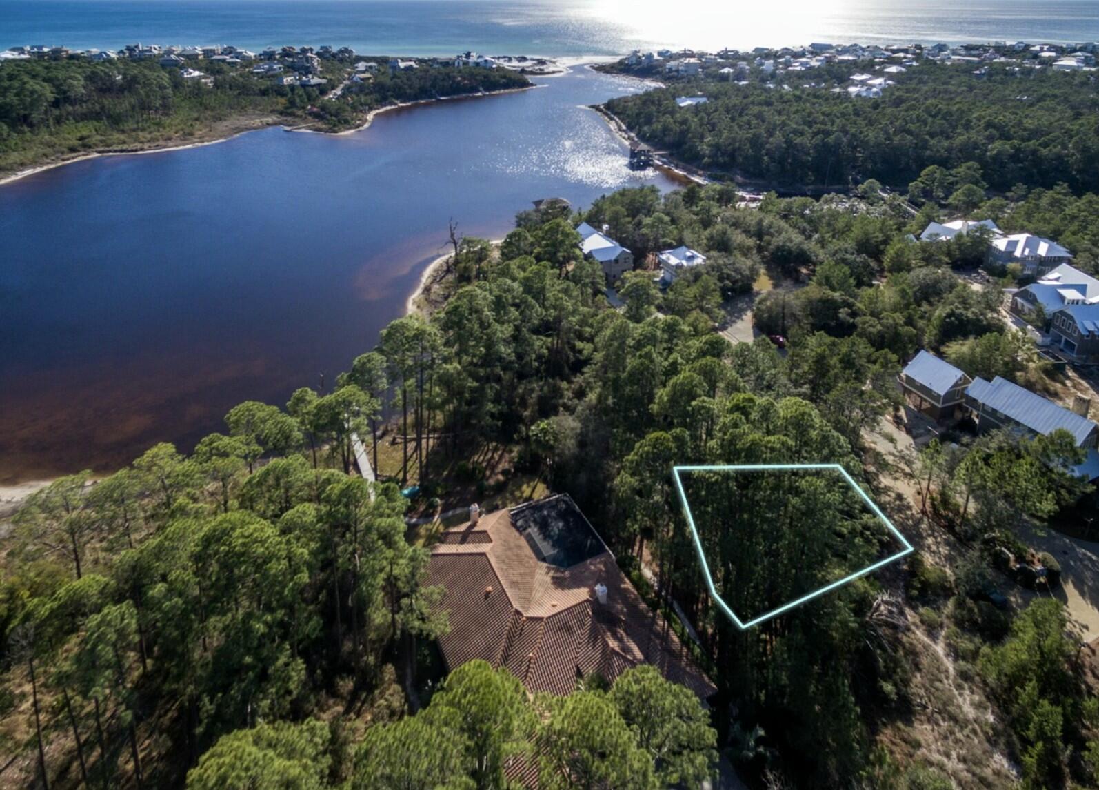 Under Contract with 24-hour Kick out clause Nestled south of the iconic 30A corridor, Draper Lake Coastal Village is reknowned for its lush setting amidst live oaks, towering long leaf pines and a tranquil Dune lake with Gulf vistas. Every detail, from the Bobby McAlpine boathouses to the gorgeous pools and meandering paths amongst the 40-acre master planned preserve makes this one of the most sought after communites along 30A.. 

A gorgeous home has been designed, by Victoria Lidstrom of the award winning Chicago design firm, LeggyBird Designs, to take full advantage of this homesite's stunning beauty. A private pool, expansive windows, elevator, attached coachouse with private stair and verandas with non stop views...are some  of the timeless features of the homes floorplans.