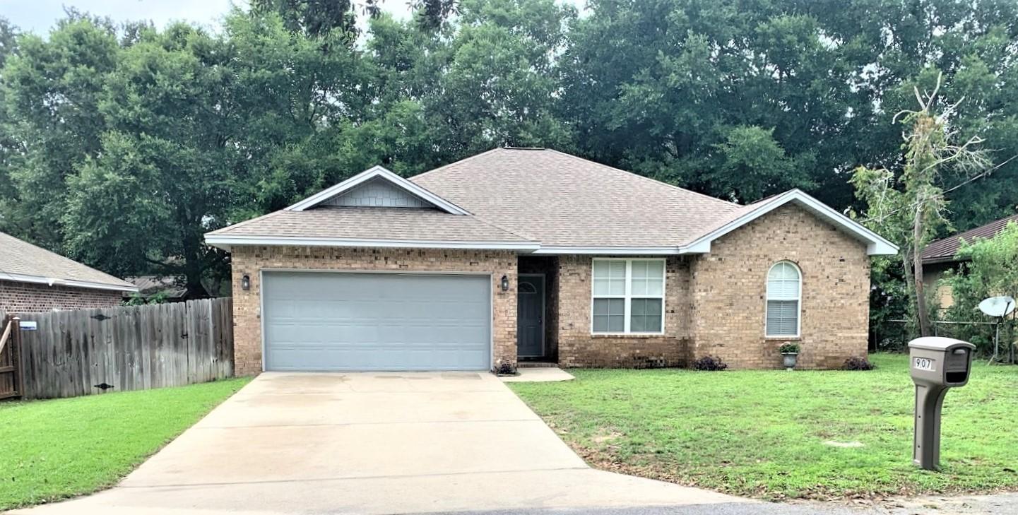 WELCOME HOME to this beautiful move in ready 4/2 in the highly desirable Niceville area!! Only 10 mins to Eglin and Duke Field, 2-5 mins to college and all schools, Niceville Children's Park, library, shopping, restaurants! The spacious open floor plan is ideal for how we live today! Enjoy tons of cabinet space in the kitchen, stainless appliances, granite countertops with a breakfast bar for extra seating. The dining area is open to the kitchen/family room and is bathed in light from the wall of windows overlooking the backyard! The back door is located off the dining area for easy access to your covered patio and newly sodded backyard! The home features beautiful wood laminate floors and crown in main living areas, tile in bathrooms and carpet (2 yrs old) in bedrooms. A MUST SEE