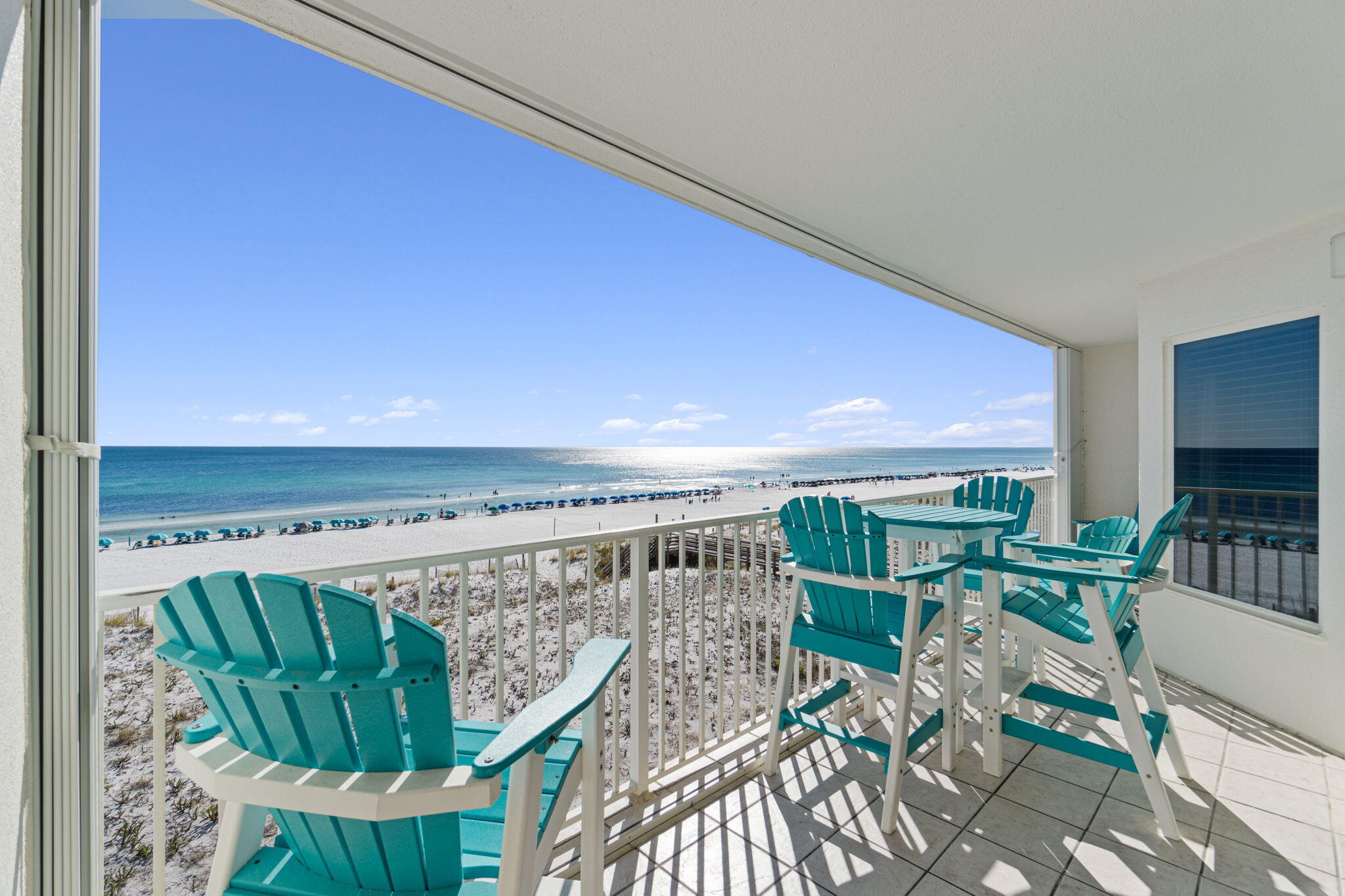Welcome to your gulf front retreat in Gulf Dunes on beautiful Okaloosa Island in Fort Walton Beach! This beautifully updated 5th story end unit offers unobstructed views of the sea oat blanketed dunes, white sand beach, and the emerald waters of the Gulf.

The unit comes fully furnished and rental-ready, making it an excellent investment property and/or vacation getaway. It also uniquely includes its own covered parking spot, a rare feature for beach condos.

This true 3-bedroom, 3 full bathroom floor plan comfortably accommodates up to eight adults. The kitchen, dining, and family room are all open to one another, creating a bright and modern living space with windows down the side of the unit to enhance the breathtaking views.

The kitchen features stainless steel subway tile backsplash, and a granite peninsula breakfast bar with shiplap detailing. Updated luxury vinyl plank flooring runs throughout the entire unit. Each bathroom has been refreshed with granite countertops, new sinks, mirrors, and light fixtures.

The family room showcases stunning Gulf views, seating for up to six adults, a queen sized sleeper sofa, and access to the Gulf front balcony with durable patio furniture - the perfect place to enjoy your morning coffee or a sunset cocktail.

The Gulf Dunes complex offers fantastic amenities, including two pools (one heated seasonally), a gas grill and picnic area, two beach access walkways, an exercise room, a tennis court, and ample parking.

Rental income performance:
2023: $78,108.39
2024: $71,690.19
2025 (as of September): $64,232.06 and counting

Don't miss the opportunity to own this exceptional corner unit with breathtaking Gulf views and proven rental history!