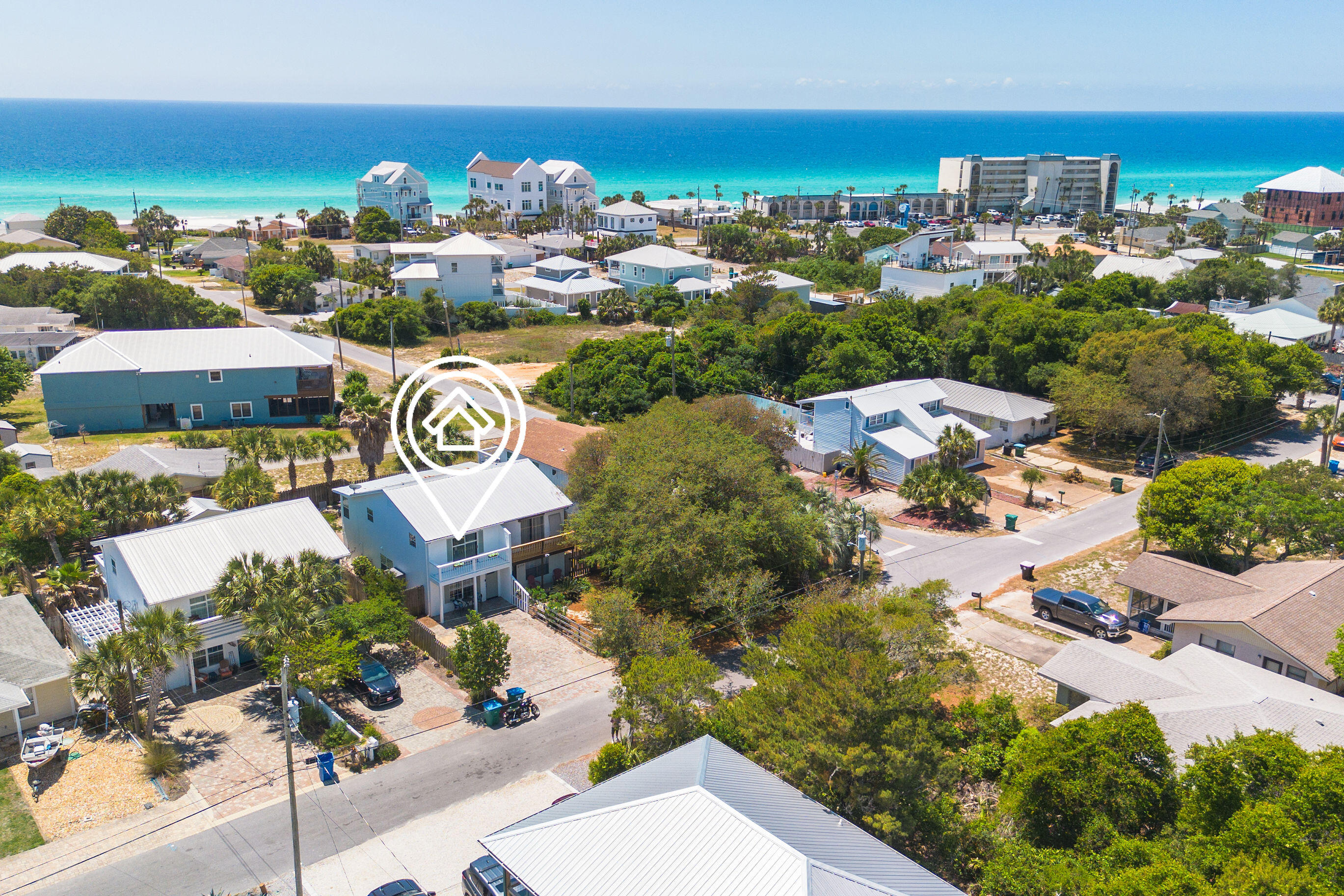Just moments from the sugar-white sands of the Gulf, this beautifully updated beach townhome is the perfect coastal retreat. Enjoy fresh, gorgeous new paint inside and out, upgraded hardware fixtures in the kitchen and baths, and brand-new luxurious carpeting throughout the second floor. Step out to your private back yard for lounging, sun-bathing, or a quick outdoor shower after a long day at the beach. Whether you're looking for a serene home away from home or a high-performing short-term rental, this turnkey property is ready to impress. Coastal charm, comfort, and convenience all in one package! Schedule your showing now!