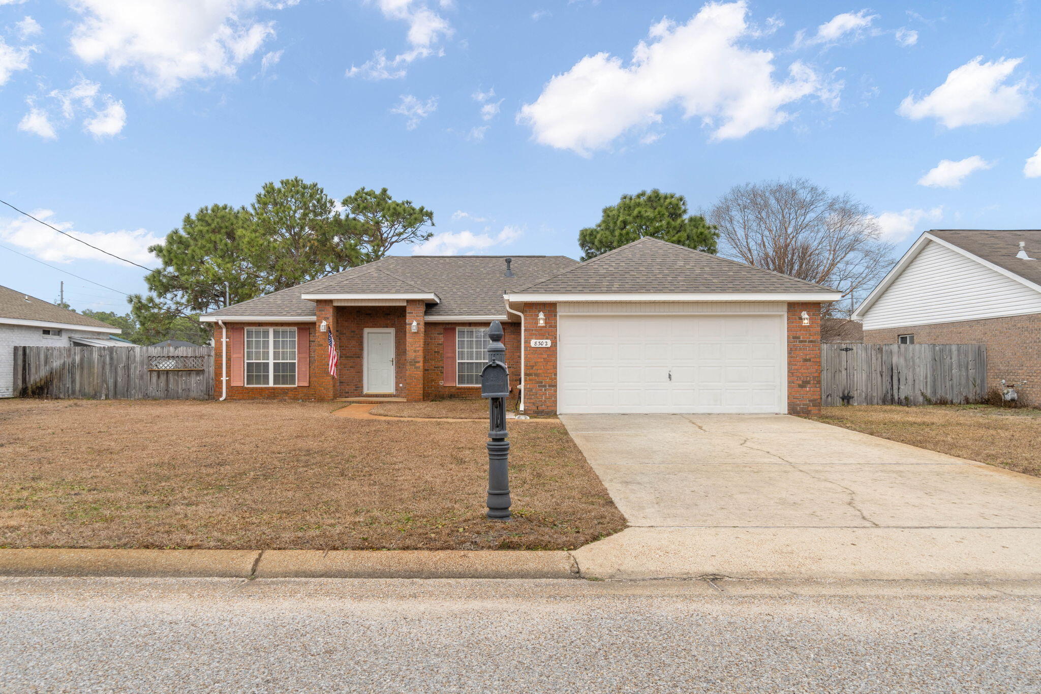 *Brand new January 2024 roof!!* Welcome to this lovely and perfectly located 4 bedroom/2 bath east Navarre home. Enjoy being biking distance to the YMCA and Navarre Youth Sports Association, minutes to Navarre's beautiful beaches, and a short commute to Hurlburt Field; and have peace of mind with a brand new roof, a 2022 HVAC, and 2021 water heater! Outside you'll find a fantastic screened in patio to enjoy within a fully privacy fenced in yard with an extended paver space to enjoy as well as two backyard storage buildings! The yard also has a full irrigation system on a well. Inside you'll find a well thought out split floor plan featuring a vaulted ceiling in the living room which is open to the formal dining room. The kitchen is a great space with plenty of counter space and an island complete with a pantry and an eat in kitchen area. The master bedroom has an en suite featuring double vanities, a walk in shower, separate soaking tub, private water closet, and a huge walk in closet! The other three bedrooms and full bathroom are located on the other side of the house with a nice sized laundry room (washer and dryer included) that leads to the two car garage. Welcome home!