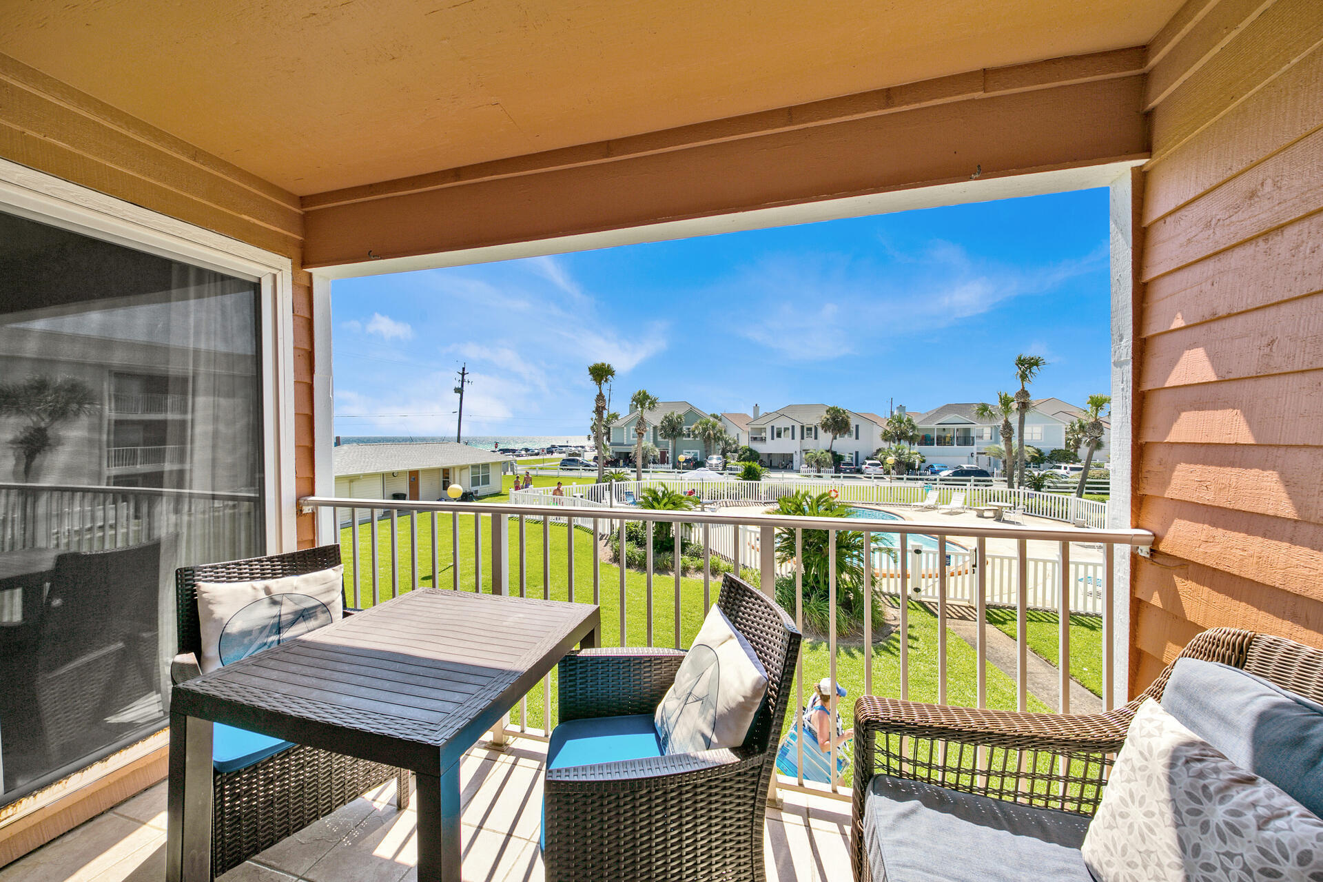 MULTIPLE PATIOS/MULTIPLE GULF VIEWS! This is a rare, Scenic 98 unit that offers both east and west side patios and both have views of the Gulf of Mexico! Located within the Tradewind condominium complex, some locals view this building as the best this fabulous 5 mile stretch of road has to offer. Three beach access, Pompano Joes, a 5 mile walk/bike path and a courtyard pool within easy walking distance of all, gives this argument tremendous clout.
In addition, over 800 sq ft of living area makes this unit ideal for spreading out or accommodating multiple families.  Updated appliances including Stainless Steel in the kitchen  and front loading washer and dryer, give the unit fresh feel. The bathrooms have been tastefully remodeled with new showers and vanities.  Kids will love the bunk room