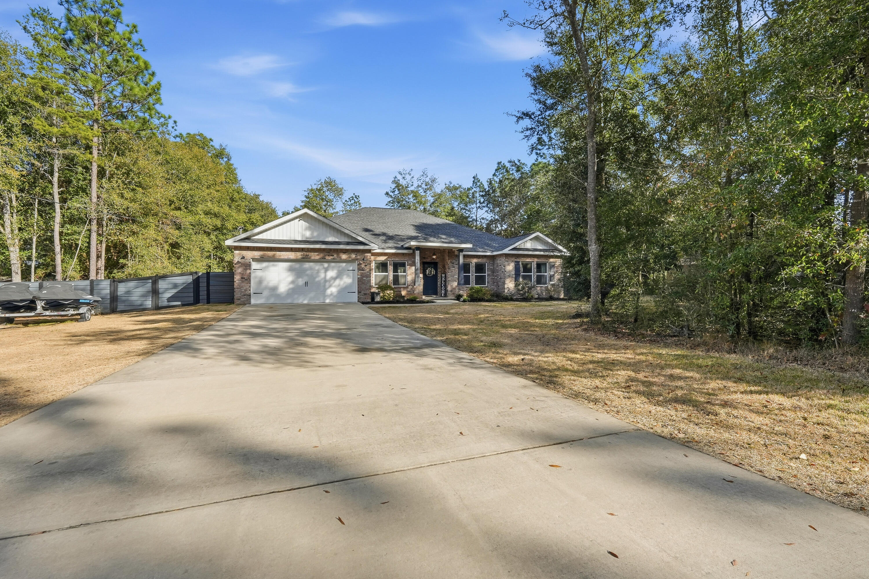 Welcome home-where space, style, and flexibility come together with no HOA restrictions! This beautifully designed 5-bed, 3-bath home offers room for everyone and sits on a generous lot, perfect for enjoying privacy and outdoor living. The kitchen shines with quartz countertops & flows into a charming eat-in area featuring custom banquette seating with built-in storage & a matching quartz table. The living room is a showstopper with a custom entertainment center, built-ins, and an electric fireplace, creating a warm and inviting space for relaxing or entertaining. A second master wing makes this home ideal for multi-gen living or hosting guests, offering privacy & comfort for extended family or visitors. Thoughtful upgrades & custom touches throughout make this home truly one of a kind.