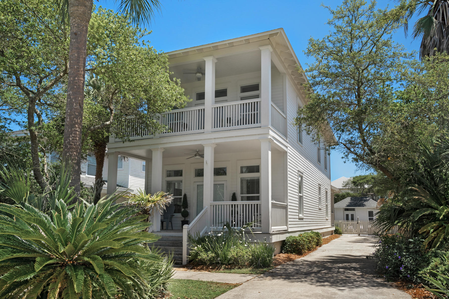 Charming coastal cottage with private pool, perfectly positioned in the beachside community of Crystal Beach. The recent remodel is graciously appointed with fine furnishings framed in coastal colors. Enjoy a high standard of living in this fortified, concrete block constructed home just a short stroll to the public beach access, Henderson Beach State Park, Destin Commons, and all that Scenic Hwy 98 and Destin have to offer. Recently installed pool and paver deck offers pristine outdoor living while maintaining a connection to the open floor plan concept of the home. Other notable outdoor features include a storage building behind the pool (also concrete construction), an elongated driveway with ample parking accommodations, rocking chair covered decks, and gorgeous mature landscaping. Inside the main level of the home you will find an open living/dining/kitchen, perfect for those who love to entertain. There's also a bedroom on the main level that connects to the first floor bath. Upstairs you will find the spacious master bedroom (currently utilized as a bunk room) with ensuite bath and connecting covered porch. There's also an additional bedroom with adjacent private bath located on this level. This home is currently being utilized as a rental investment but would also make an excellent primary or second home. This is a second owner home and was never rented by previous owners.