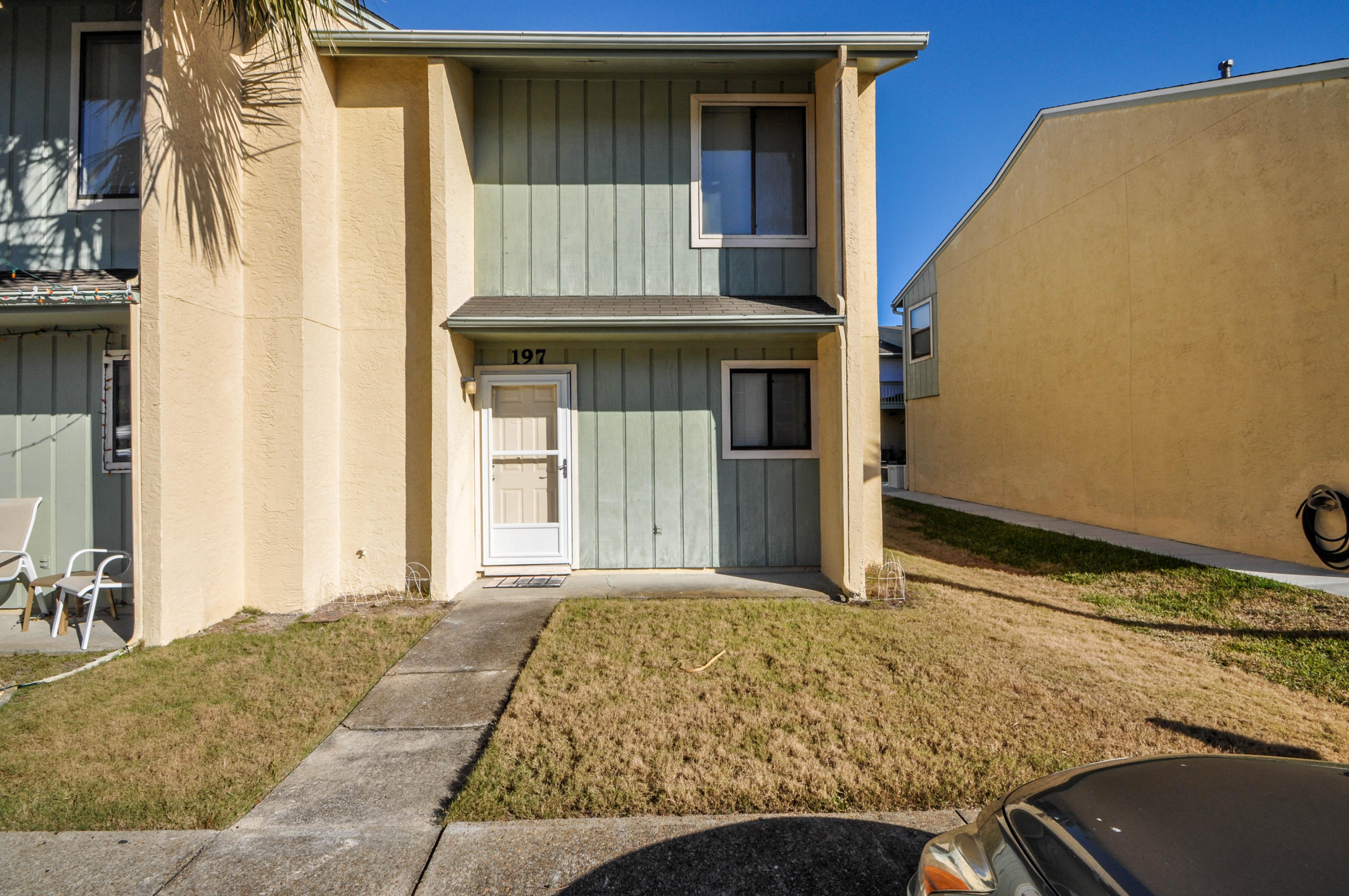 Gulf Highlands 2 bedroom Condo. This is an end unit so you have the side yard as well. This unit is just across the street from one of the 11 pools(5 of them are heated)in the complex and one of the 5 tennis courts. This complex has so much..your own fitness center, conference ctr, several shuffle board areas, an 18 hole putt putt course.. it has a clubhouse with wifi and pool on the beach..all this is yours to use free..you own the 2 parking spaces in front of your condo even the grass and side yard...No elevators to wait for.. no fighting for a parking spot.. you are surrounded by some of the best eating and shopping in the area.. alot in walking distance or take your bike....3.2 MILES OF STREET AREA PERFECT FOR WALKING, JOGGING, SKATEBOARDING OR JUST RIDING YOUR GOLF CART.