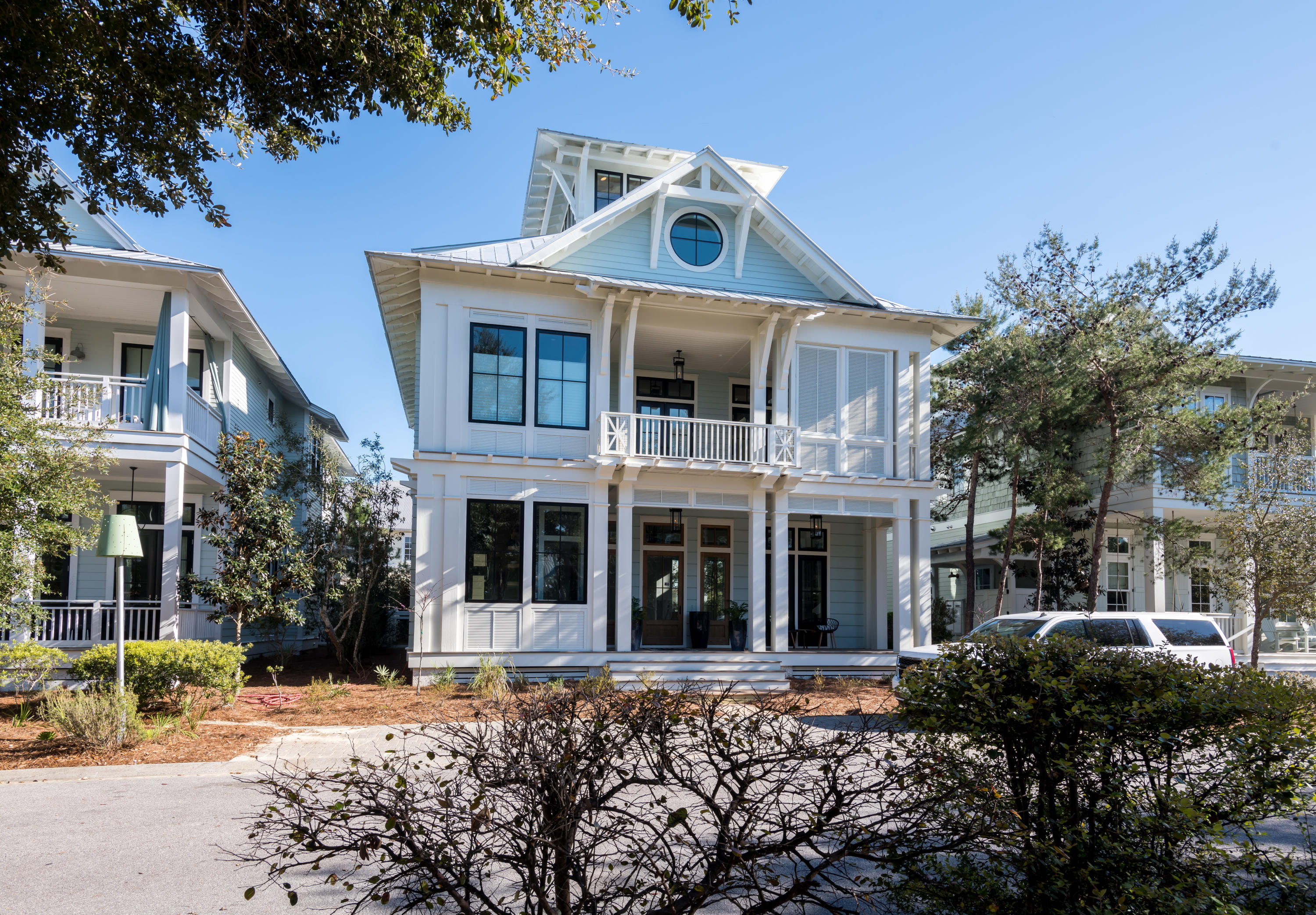 Sophisticated elegance meets traditional beauty in this expansive Watercolor, Florida masterpiece, designed by T.S. Adams and built by renowned builder Borges-Brooks Construction. Throughout this grand coastal home are exquisite reclaimed oak floors, doors, and cabinet facings soothe the eye with natural beauty, while meticulously curated tile, fixtures, and accessories provide pops of modernity in just the right proportion. The main living areas of the home are on the ground floor, which encompasses the living and dining areas plus the kitchen with large butler's pantry. High-design, custom cabinetry in the butler's pantry touts impressive and sleek storage. A collapsible glass wall opens to the outdoor kitchen and pool with s as well as a two-car garage and bathroom. Another half-bath and a wet bar with wine cooler round out the ground floor's many entertainment-minded features.  The bespoke floating staircase stuns with a blend of white oak treads and dark metal railing and supports as it winds its way to upper floors of the home.  Four of the home's five bedrooms are on the second floor.  The primary master suite features ample space to relax in the sunny sitting area or the large shaded porch, and the bathroom's oak-faced cabinets, marble countertops, and artisan tile work combine in the stunning master bath, which passes through to a large closet with ample drawers and shelving.  Also on the second floor, soaring ceilings and a beautiful wet bar make the secondary master suite almost as desirable as the primary.  Two other guest bedrooms, each situated thoughtfully off the main hallway, round out the second floor. The ceiling designs, each unique to specific areas of the home, are works of art in themselves, featuring beams and lumber reclaimed from the same Pennsylvania farm as the other wood used throughout.  

The third floor is ideal for relaxing and enjoying the resort lifestyle to its fullest.  Two large TV areas, a separate game area, bookshelves, and a bunk room with attached closet and bath mean you may never need to come downstairs!  An elevator serves the bottom three levels of the home, with another custom staircase leading the way to the fourth floor's sunroom and deck, with 360-degree views of Watercolor. The home is equipped with Apple TV sets, Sonos sound system, and other ultra high-end amenities, and is being sold fully furnished.  Home is centrally located to the best dining, unique boutique shops, bike paths and golf courses along the Emerald Coast. Easy access to Hwy. 98, allowing you easy access to Panama City and the new Northwest Florida Beaches International Airport.