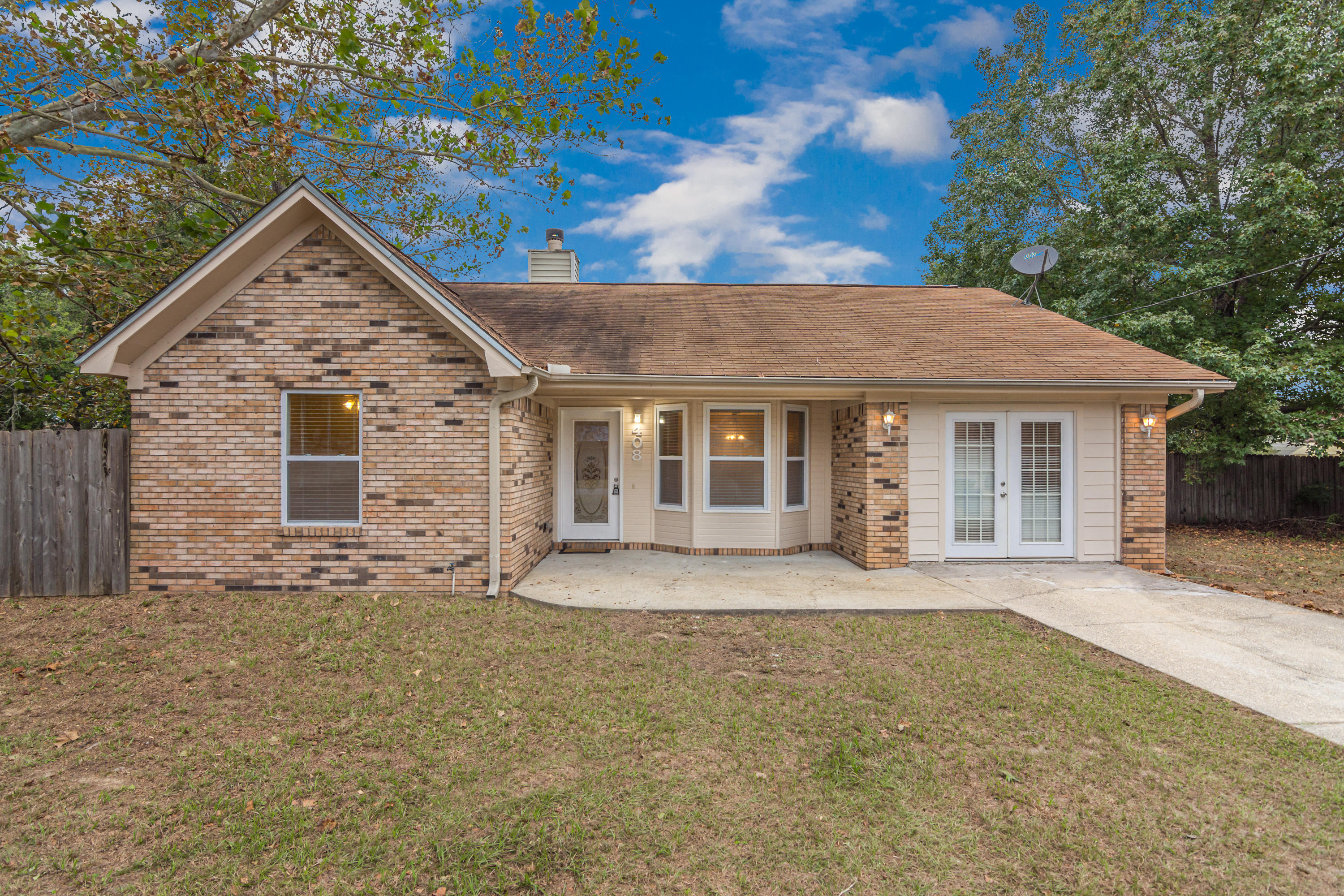 Amazing home south of I-10 on a large level lot in Crestview. Just minutes to Seventh Group and 20 minutes to EAFB. A Beautifully updated find with a neutral color pallet ready to be decorated. This home features a beautiful wood burning fireplace, tile floors, tankless water heater and an AC just a year old. This home has 4 bedrooms with a closed in garage as a flex/bonus room. The garage can easily be converted back if needed. The master bedroom is huge with a massive walk in closet. The yard is flat and level with a privacy fenced in yard and yard building out back. This home is a must see and a great deal under 200k. Will not last long!