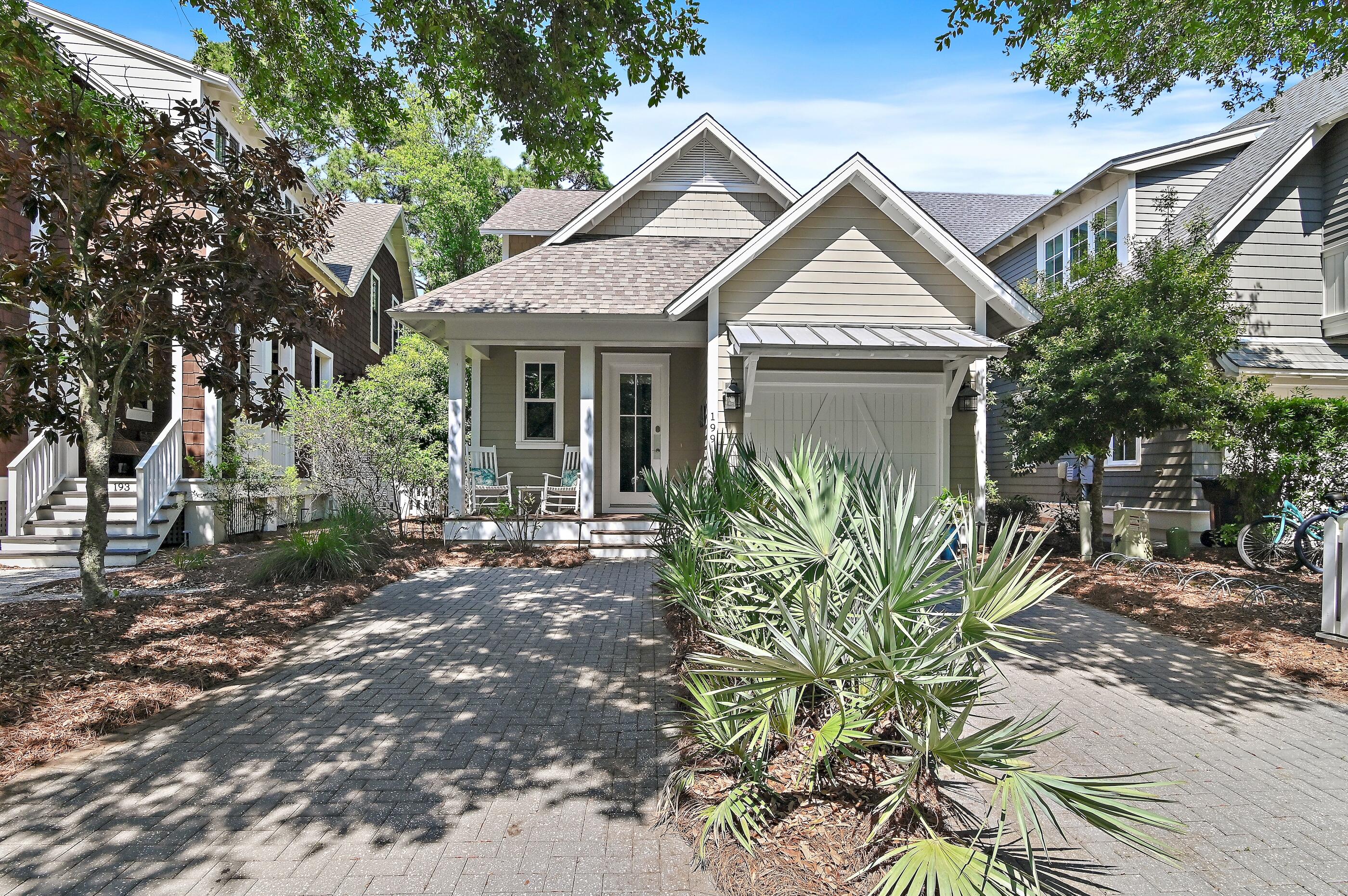 Under Contract with Kick-Out. Residing behind the private gated enclave of Watersound West Beach in the sought-after Cottage District, this like-new and fully furnished 3BD + BUNKS 'Huff Home' seamlessly blends luxury accommodations with an inviting coastal flair and was recently remodeled by the design team at Lusso Interiors. Upon initial approach, the stately paver driveway bordered by lush vegetation leads way to the impressive foyer featuring soaring 10' ceilings, shiplap planked walls, and stunning hardwood flooring. The heart of the home immediately welcomes you with a sophisticated living space meticulously designed for both relaxation and entertainment with beautiful views of the community park. The well-appointed kitchen offers custom soft-close cabinetry coupled with quartz countertops, an oversized kitchen island with integrated seating, all new tableware, and a luxury appliance suite with a gas range. The screened-in porch offers a true continuation of living space overlooking the surrounding topography creating the perfect setting for reading a book or enjoying an evening night cap.
A spacious first-floor junior suite with private en-suite, laundry and powder room complete the first level.

The primary suite is graced with natural light and equipped with a walk-in closet and private covered terrace spanning the entire width of the home. The luxurious ensuite affords a spa-like experience with a garden-style soaking tub, double vanity, an enclosed water closet, and walk-in wet room. coastal-themed, second-floor XL bunk room features built-in bunks, a cozy seating area with a TV, and is the perfect hangout spot for the kids. An additional guest suite currently configured with 2 twin beds and direct access to a full bath complete the top level.

WaterSound West is inspired by coastal villages with traditional block patterns, walkable streets, parks, and an architectural style that responds to the climate and to the setting's natural features. Bordered by Deer Lake Park, a nearly a 200-acre preserve, this extraordinary community offers dedicated beach access, placing the sugary-white sands and emerald waters of the Gulf just moments away. This sophisticated, yet quaint, neighborhood provides residents with heightened privacy and an array of amenities for your comfort and enjoyment such as a resort-style swimming pool with outdoor grill and fireplace, beautifully crafted boardwalks, a puttering park for all ages, and plenty of parks, winding trails, natural areas, while remaining geographically poised near all of the acclaimed dining and entertainment venues 30A has to offer.
Notable upgrades include newly painted interior, new quartz countertops throughout, new water heater, newer HVAC systems, new furnishings, light fixtures, plumbing fixtures, etc. With impressive rental income projections totaling $75,000 per year, "New Beginnings" is offered fully furnished and is a true turn- key home, presenting a compelling opportunity for investors and full-time or second-home residents alike. Inquire today to arrange a viewing and start envisioning the coastal lifestyle you deserve.