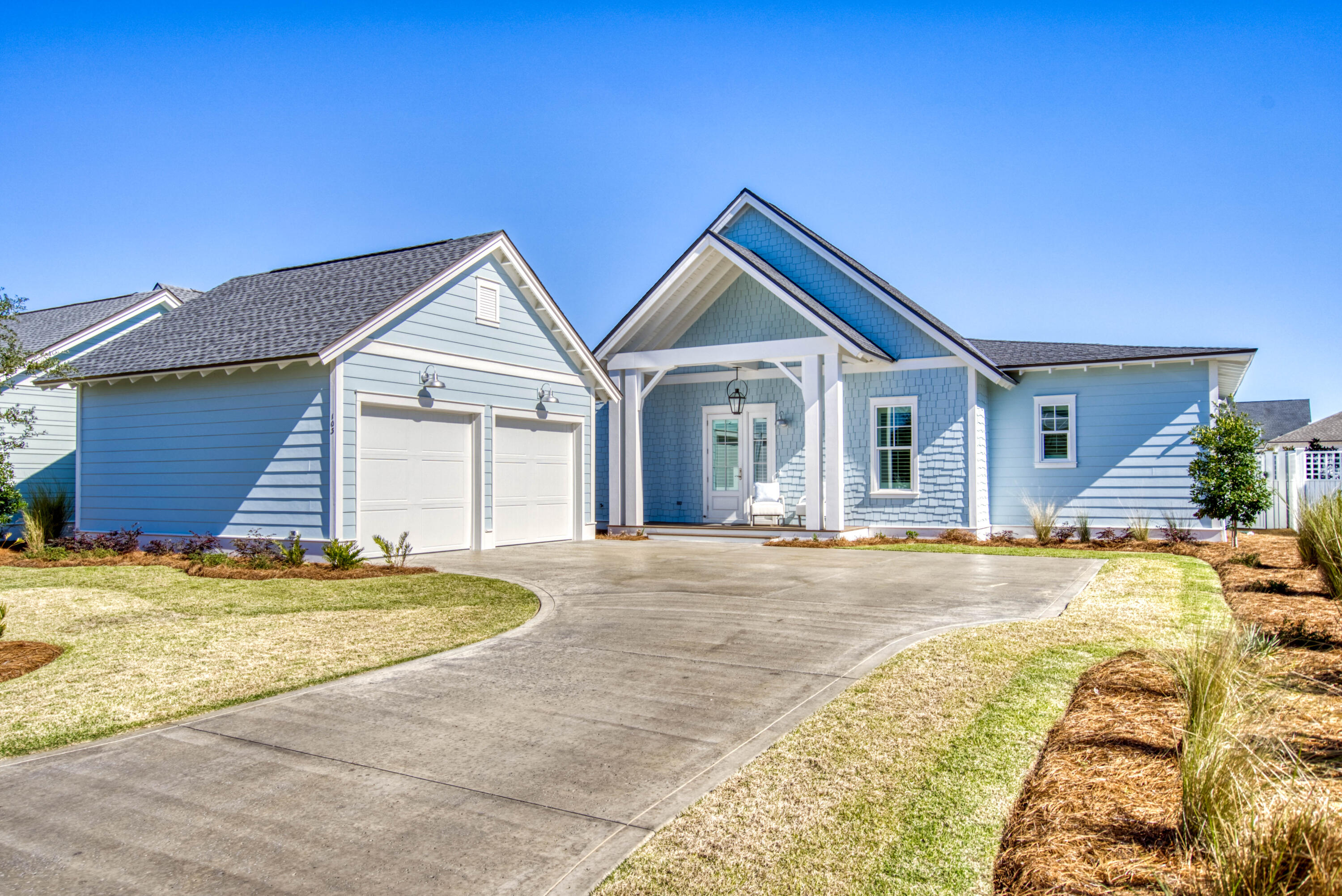 This Like-New Romair built home was completed in 2021 and has been lightly occupied as a second home since. Upgraded landscaping was recently completed as well as a Saltwater gunite pool complete with heater, a waterfall, sunning ledge and pool umbrella. Open floor plan with beautiful wide-plank hardwood flooring and 3.5'' wood shutters throughout.  Gourmet kitchen is equipped with 12' Quartz Kitchen island, Thermador Dual Fuel range and Hood, Bosch French Door Refrigerator and dishwasher, Sharp Drawer Microwave, under cabinet lighting and a large walkthrough pantry. Spacious living area offers  upgraded sliding doors to the screened in patio and oversized backyard. Master suite features two walk-in closets and a private bathroom with double vanities, (See more) separate shower and garden tub. There are 3 additional bedrooms, 1 with an ensuite bathroom and the other 2 share a Jack and Jill bathroom. Additional features include a private office room, spacious laundry room, 2 car garage with 50 amp plug for EV electric vehicle, Simply Safe security and camera systems, upgraded 20 SEER A/C and more. This home is a short walk to all the incredible amenities Watersound Origins has to offer including the fitness center, pool, dock access at Lake Powell, Tennis Courts, Open Green spaces, Golf Course and more.