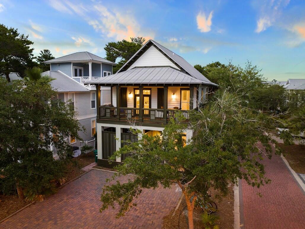 The ideal vacation getaway! Nestled between Alys Beach & Rosemary Beach sits this beautiful home that is currently a profitable short-term rental. It has generated annual revenue exceeding $160k in 2024 and 2025 and has received over seventy 5-star reviews! It has brand new HVAC systems, hot water heaters, washer/dryer, & TV's. (No worrying about major systems failing during guest stays!) This is the ideal purchase for someone looking to operate a profitable rental property, or someone who would like to have a second home that pays for itself. The house is already equipped with an electronic lock for remote management, a nest camera doorbell, a locked owner's closet, fully stocked linens & towels, a fully stocked kitchen, etc. The house comes fully furnished, & it is completely turn-key. The current owner is also willing to provide existing professional photos (shown here) to the new owner to help you get your rental listing up and running immediately after closing!

There are already established relationships with a reliable cleaning team, handyman, etc. The current owner is happy to make introductions to all current team members to offer a seamless transition to the new owners. The current owners are also willing to offer management tips to new owners during the contract period if desired. 

This house is on a beautiful and private corner lot, has spacious covered porches, and backs up to green space (setting it apart from most other homes in the area), soaring ceilings, and tons of natural light. It also offers deeded beach access, a 12,000-foot lagoon pool, 1.3 miles of walking/bike trails, tram service, and 24 hour security. This unique property is within walking distance to everything the area has to offer!