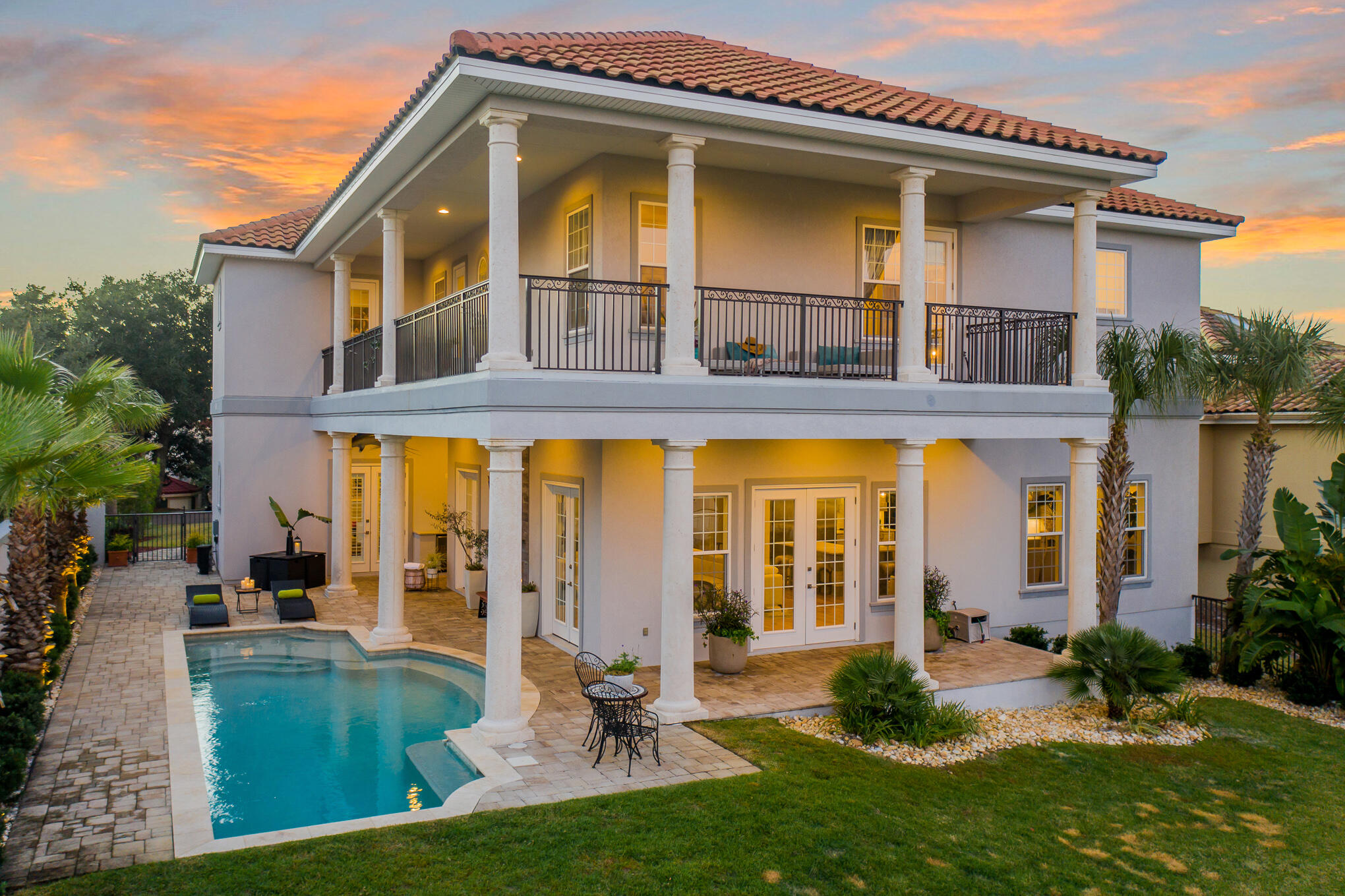 From its commanding location atop Sandestin's highest dune, this home welcomes you with a perfect blend of open floor plan living and private, thoughtfully curated spaces. The ground level is airy and spacious, an inspiration to entertain family and friends. Indoor space and outdoor space flow freely into each other. The indoor/outdoor fusion,emphasized by the stunning glass fireplace between living room and pool, captures the beach breeze year round. The kitchen is an open invitation for people to gather and enjoy good food and conversation. Yet the bedrooms are private, 'en suite' retreats. Expanding its spacious elegance, the primary bedroom reserves the most magnificent view for itself. Stretched below is the 13th fairway of the Baytowne Golf Course. A fabulous addition to the home is  a poolside guest suite, replete with kitchenette, with a cheerful energy, artfully created by the combination of its architecture and interior design. The must-haves for a Sandestin Beachside home  walk-in-entry, 3-car garage, outdoor kitchen, high ceilings  are all part of the ambiance. Offered furnished with some exclusions.