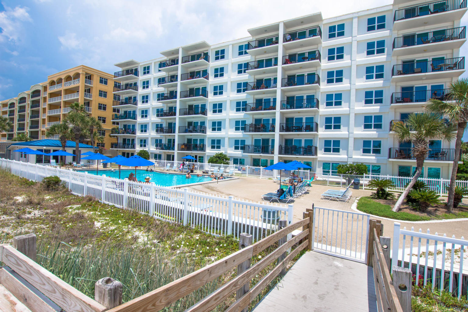 NEWLY RENOVATED 2-Bedroom Condo at the beach. This will be your happy place! And it's the deal you've been waiting for...situated on the best stretch of Okaloosa Island's white sand beach, an amazing price for a Gulf front 2 bedroom! This stunning condo conveys fully furnished and rental equipped and offers a spacious and beautifully furnished living room, Gulf view master suite with ensuite, upgraded plantation shutters plus a large guest bedroom. Kitchen has beautiful granite countertops, tile backsplash, stainless steel appliances. This condo also features a washer and dryer in unit.  Come and discover the many treasures of Sea Oats including private beach access, a sparkling pool, fitness center, hot tub, tennis courts and bbq grills Sea Oats is perfectly located near the best shopping, dining, restaurants and entertainment with many options within walking distance! Sea Oats building improvements include: new sliding glass doors, windows, exterior stucco railings freshly painted exterior!