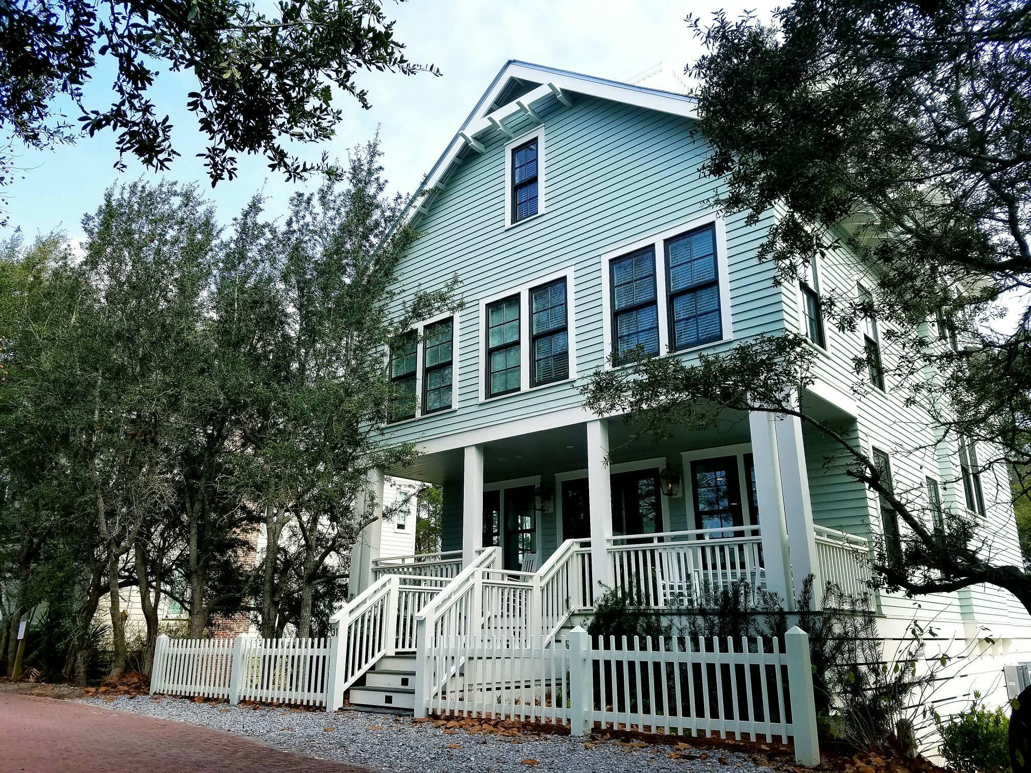 This spacious 4,426 sq ft, four story, fully furnished, beautifully designed beach home combines meticulous details for luxurious living with a casual sophistication. No matter the season, there promises to be sunshine in one's soul for those fortunate enough to reside at 31 Wakulla Lane. If Home is where the Heart is then prepare for a true Love Affair.
Happiness may be enjoying a cup of coffee while reading the morning paper on the front porch rockers overlooking the croquet field. Happiness may be the gas lamp beacons of welcome into the heart and soul of this majestic home designed with an open floor plan of kitchen, dining and living room encased with bright and airy, floor to ceiling, sundrenched windows and walls of a soothing sea glass palate. Happiness may be watching the chef of the family creating culinary delights in a state of the art kitchen complete with Thermador appliance for guests to sample while comfortably congregating around the Turkish Carrera Marble Island. It may just be gathering for a casual family dinner followed with a challenging game of cards by the gas fireplace. Or for the host, simply escaping to the first floor master suite to the tranquility of a luxurious soaking tub within a massive marble shower. For the technology guru, happiness may be the sonos surround sound system, nest thermostats and ring doorbell, all centrally controlled on an Apple iPad.  For others, the roof top deck with a fire pit for apres dinner cocktails and celestial skies to satisfy that appreciative stargazer that lives in all of us. Happiness may be retiring each evening to the second floor to the privacy of three large bedrooms each with it's own luxurious en suite bathroom and a darling three story custom nautical bunkroom for the little ones. Happiness may be a need for peace and early morning solitude in the fourth floor sundrenched tower sitting area, surrounded with breathtaking panoramic views of the gulf. For others, happiness may be the third floor entertainment area complete with a game area, wet bar, 4K TV and comfy sofas to lounge upon luring the video game players and sports buffs.  Of course, happiness may be at ground level where tucked behind a barn door is a cool bonus room and a private bathroom, ideal for those energetic teenage years. There is plenty of additional storage for bikes, paddleboards, fishing gear, golf clubs and cubbies for beach necessities for all outdoor enthusiasts. It's just a few minutes to walk to the beach or to the Seaside Town Square which hosts an array of boutiques, coffee shops, restaurants, bookstores, and a wide variety of outdoor events.  

We believe you'll discover that charm and character abound in this exceptional four- story home, creating an inner sense of happiness fulfilling every hope and dream, no matter the age. If you're looking for gracious living, look no further. Welcome home to 31 Wakulla Lane.