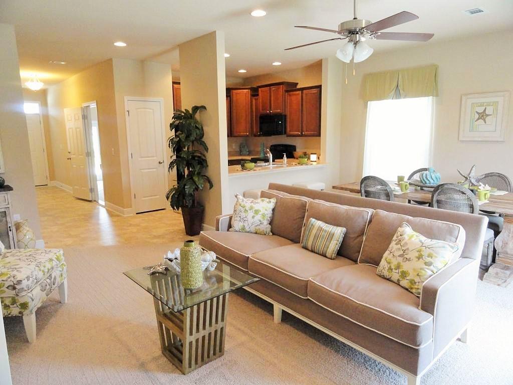 Affordable and low maintenance with this new townhome. Close to Interstate 10, HWY 85, schools, hospital and Walmart. Home comes with a 1 year builder and 10 year structural warranty. Stainless steel microwave, range and dishwasher. Pictures are of a similar home. Listing Broker/Sales Person has ownership interest in the property. Square footage dimensions are approximate.