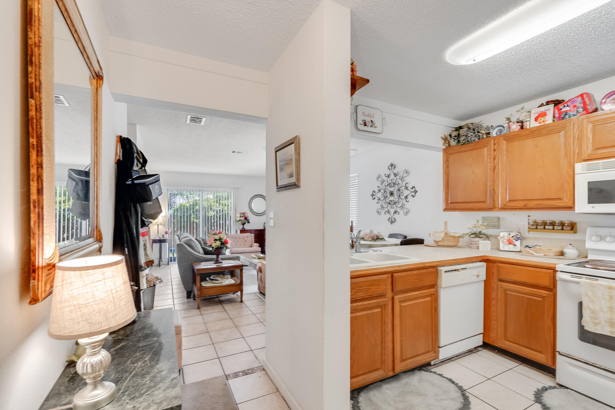 Welcome to this inviting first-floor condo located in the desirable Island Winds community of Fort Walton Beach. This two-bedroom, one-bath home offers comfort, convenience, and a touch of coastal charm. Step inside to find an open living area that flows seamlessly to your patio and storage area. .
Both bedrooms are spacious, and the full bath is conveniently situated between them. The kitchen is well-appointed, and the adjoining dining and living areas make everyday living a breeze.
Located on the first floor, this unit is easily accessible--no stairs required. The Island Winds community is known for its welcoming atmosphere and ideal location, with a 3 minute walk to beach access.