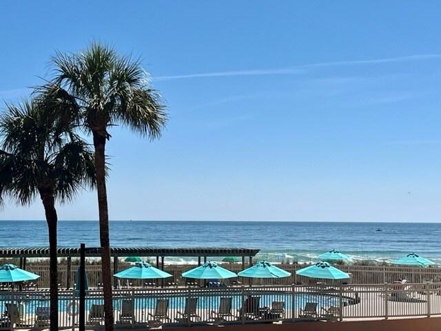 NEW PRICING!  Jetty East is a Gated 6-story midrise with under building parking located on the beautiful sugar sand beach in Destin, Fl. The location is unique as it is located on Holiday Isle (Gulf Shore Drive) which ends at Destin Harbor.  It's great for biking or walking. The jetties of the east pass make a great spot to snorkel or fish from the jetties.   Jetty East is one of the few condos to offer covered parking.  The required Milestone Study and Structural Reserve Study were completed mid-summer. There was an assessment August 1, 2024, for replacing the building sky light.   Unit 117B features an OPEN, INVITING, ELEVATED 1ST FLOOR GULF-VIEW 2 BEDROOM/2 BATH UNIT.  It is conveniently located near the elevator for quick and easy access to the beach or pool.  Updated kitchen countertops and backsplash. The Unit boasts diagonally laid porcelain tile, granite bathroom counters, stainless-steel appliances and crown molding. Master bath has been updated with long vanity.  The breathtaking gulf views are visible from the kitchen, the living room and Master Bath.   Rental Income    2022 $55,000   2023 $53,00 2024 $41,000 The unit features EFCO (category4) sliding glass doors and windows paid for by the seller.  Approximately $25,000 value.  Begin and end each day enjoying spectacular morning views of the Gulf of Mexico. Enjoy evening sunsets and seasonal fireworks from the beach. Great location for shopping, grocery stores (New Publix) and restaurants. Jetty East Amenities: 900 feet of beach, 2400 sq. ft. pool with sun deck, hot tub, beach side pavilion with charcoal grills, tennis courts, pickleball, fitness room, kids' activities, music entertainment, shuffleboard, covered parking, 24-hour security. Nice owners room with full kitchen for meetings or parties.  Financing Note: Jetty is a Non-warrantable/ Condotel.   No conventional (government backed Fannie or Freddie) financing.