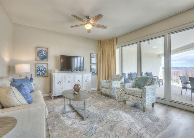 Welcome to this beautifully renovated and fully furnished end unit in the condominium community of Tides At Tops'l. This unit offers a great open floorplan opening up to a large inviting balcony for living and entertaining the beach life. This unit has been tastefully updated inside with upgraded kitchen appliances; luxury vinyl wood flooring though out; kitchen granite countertops and updated furnishing and décor. Tides At Tops'l has also undergone exterior renovations to include exterior building paint; pool deck resurfacing; new exterior doors in addition to updated walkways and balconies. This is all within the gated community of Tops'l Resort with amenities including deeded beach access and another beach side pool. Tops'l Resort Club is also available for owners to join and enjoy... tennis courts; fitness center; pickle ball courts and raquet ball courts to name a few. This gated gulf front lifestyle is all conveniently located close to award winning restaurants; shopping; movie theater; grocery and entertainment just outside the gates. Come see and enjoy the beach community lifestyle