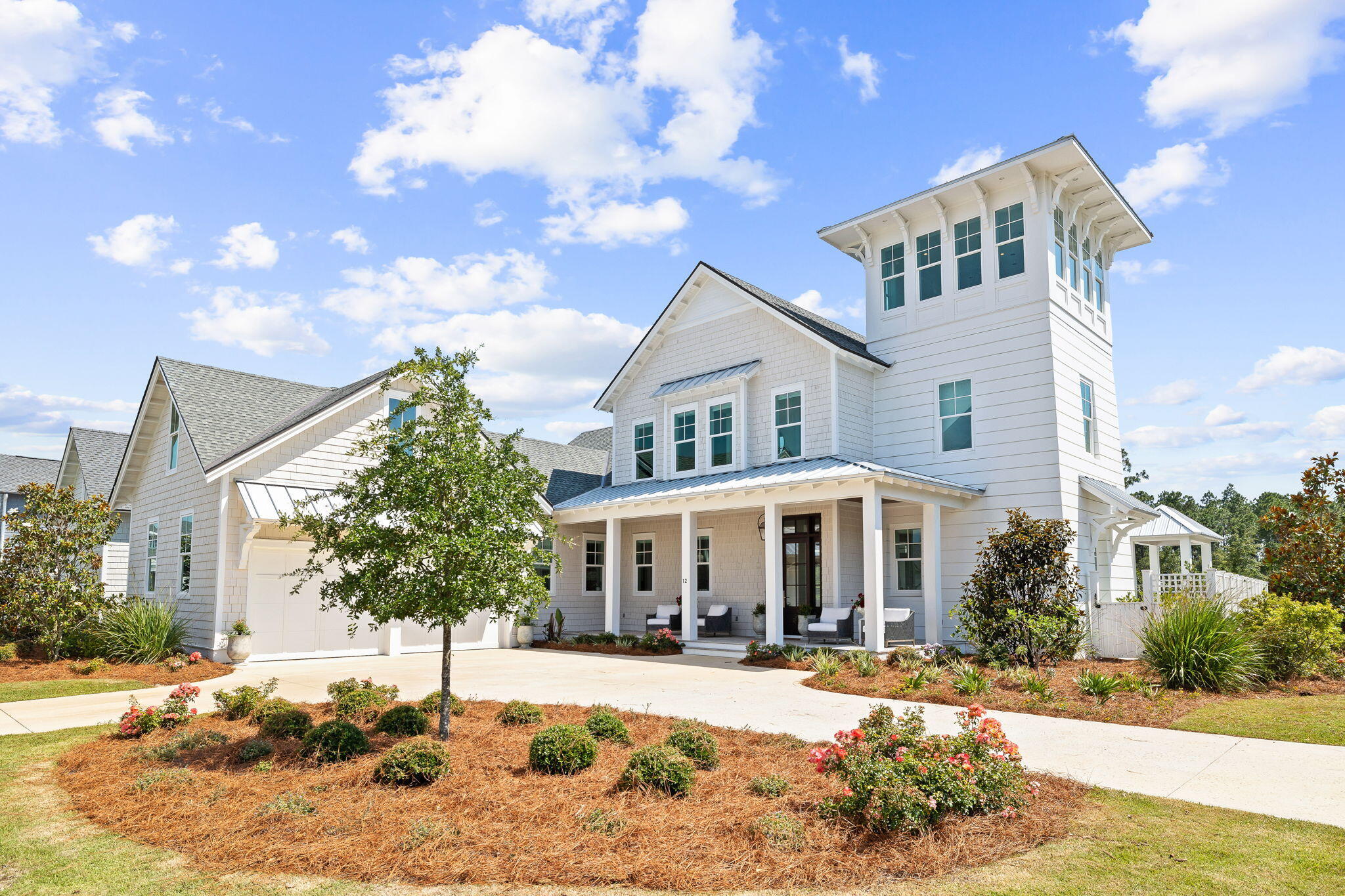 Taking Back Up offers! Sold Furnished with Exclusions! Luxury meets effortless charm at this stunning coastal retreat in the coveted Watersound Origins community. Designed by Dune Construction and featuring the popular Watchtower Plan, this exceptional 4BR/5BA residence graces a premium corner lot at the entrance of the premier Stillwater neighborhood. With a spacious 4,069 square feet, this residence promises a seamless blend of style and functionality, for added flexibility. 
As you enter, you're greeted by an open-concept main living area, where 11-foot ceilings, exposed wood beams, shiplap walls, hardwood floors, and a striking rounded wall of windows set an impressive stage. The gourmet kitchen, outfitted with high-end appliances and custom cabinetry, flows gracefully into the  great room and dining area, complete with a cozy gas fireplace for added ambiance. The first level primary suite is a serene sanctuary, featuring a large walk-in shower, freestanding tub, expansive closet, and direct access to the conveniently located laundry room. Upstairs, three additional bedrooms are equally well-appointed, each featuring custom cabinetry and ample closet space. A second-floor den offers a private space for gathering and relaxation, creating the perfect hub for family enjoyment.
Outdoor living here is truly unrivaled. Step into your private oasis with a pool, spa, and multiple covered porches ideal for soaking in the coastal breeze. Two beautifully crafted cabanas elevate the experience: one featuring a fireplace for cozy evenings, and the other an outdoor kitchen designed for culinary adventures. The kitchen cabana includes a Wolf grill, mini fridge, ice maker, and a specialized High Range Boiler with a long-handle faucet, perfect for hosting seafood boils and cookouts with ease. This must-see home embodies a lifestyle of sophistication, relaxation, and coastal beauty, offering an unparalleled living experience in the sought-after Watersound Origins Community.
Watersound Origins offers South Walton residents the perfect blend of natural beauty and modern amenities. Surrounded by towering pines and Lake Powell, the community is only two miles from the vibrant beaches of Scenic Highway 30A. The Village Commons serves as the neighborhood hub, featuring a resort-style pool, fitness center, pickleball and tennis courts, and an event lawn. Residents enjoy access to the highly rated Origins Golf Course, scenic walking and biking trails, Lake Powell, and an upcoming Art Park along with the Watersound Town Center at the entrance to the community with dining, shopping, a Publix grocery store, medical facilities, and more.