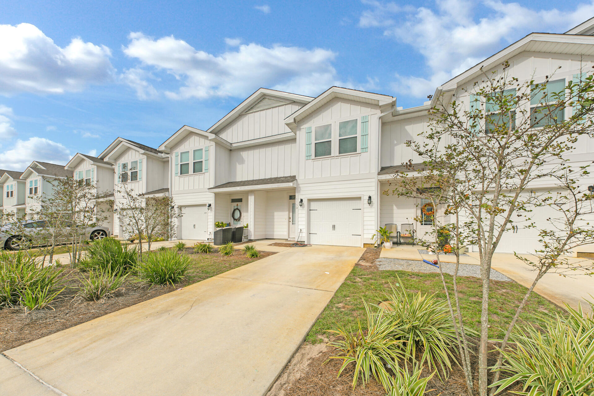 Don't miss out on a wonderful opportunity to own this gorgeous townhome with upgraded LVP flooring, granite countertops, white shaker cabinets, and stainless steel appliances! This beauty is located just minutes away from 30a and some of the country's best beaches, incredible shopping, and world class dining.
Miller's Crossing is in a central location to both Destin, and Panama City Beach, allowing you to enjoy the best of both worlds! Within walking distance to Alaqua Unleashed Dog park, Padgett Park, nature trails and public library.