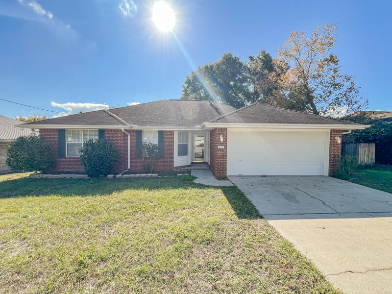 Available 03/07/2025....Easy commute to bases, beaches and shopping.  South Crestview convenience.  Spacious home lives large.  Split floor plan with vaulted ceilings, large bedrooms and bathrooms.  Open back patio with plenty of room in the backyard for entertaining.  Yard building for lawn equipment.  Eat in kitchen area with laminate flooring.  2 car garage and fenced back yard.  No inside smoking or vaping.  Pets will be allowed with a $400 non-refundable pet fee.  Desirable Antioch Estates.