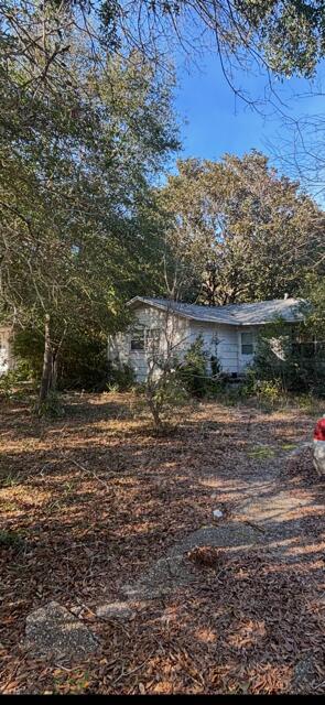 Property and the existing home are sold as is. Lots of potential, investor special.