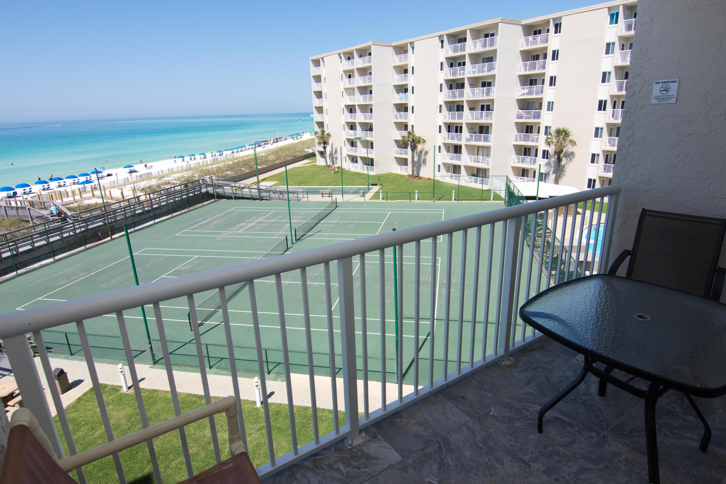 Stunning 2 bedroom unit at the popular Holiday Surf and Racquet Club! Enjoy beautiful gulf views from this gorgeous condo's private balcony on the 4th floor. Holiday Surf & Racquet Club has tennis courts, shuffle board, boardwalk, his and hers exercise rooms, beautiful lobby, landscaping throughout the complex and game room! Don't delay and capture your piece of paradise today at Holiday Surf where a major renovation was just completed to make this condominium feel like new. This unit has a seasoned rental history and is turn-key!
