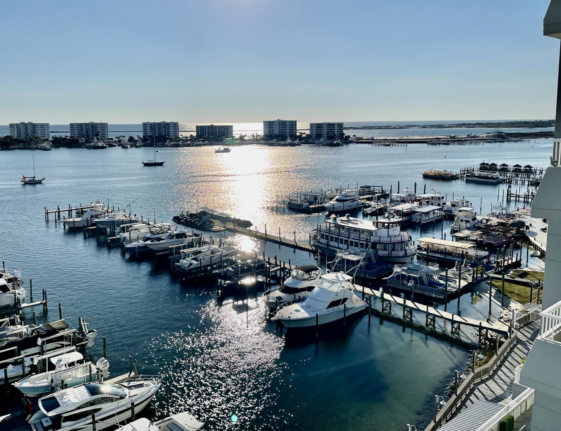Beautifully renovated 3BR/3BA non-rental harbor front condo offering stunning views of the harbor, East pass and Gulf. Enjoy watching boats, dolphins and spectacular sunrises and sunsets from this picturesque residence. Designed in refined coastal elegance, each bedroom features a private en-suite bath. The building offers upscale amenities including a fitness center, owners lounge, heated pool, and outdoor bar overlooking the harbor. Walk to shopping and Destin's best restaurants. Ideal as a primary residence or luxurious 2nd home. Unit is sold with boat slip # 40.