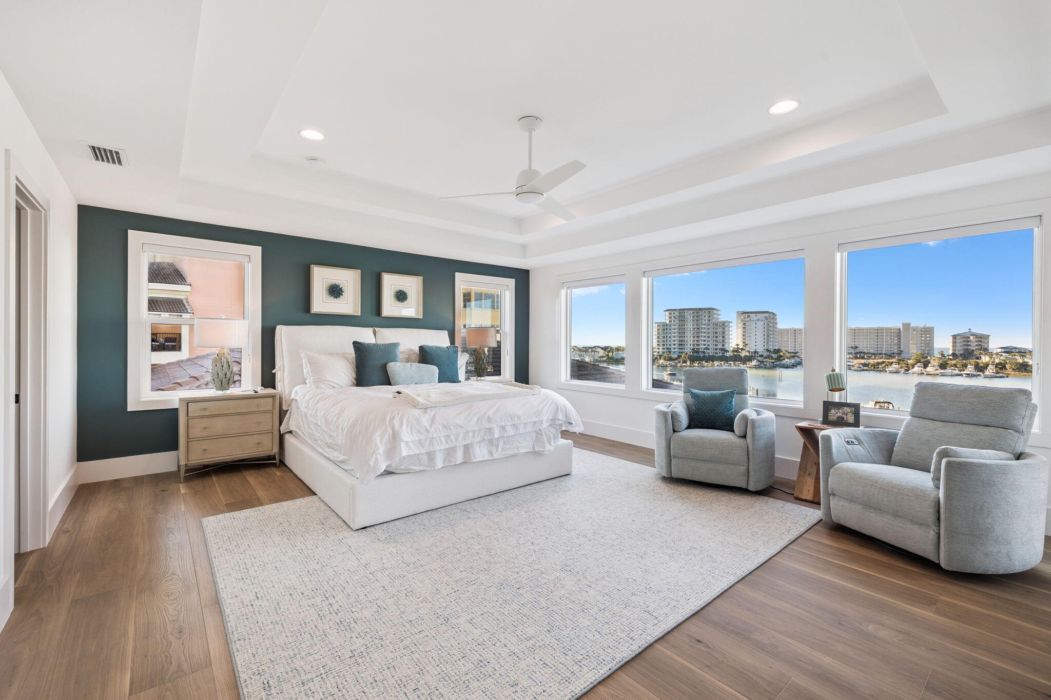 Completed in 2024, this stunning harborfront home offers the ultimate in luxury coastal living with panoramic views of both the Destin Harbor and the Gulf. Thoughtfully designed and newly built, this residence captures the best of modern architecture and waterfront elegance in one of Destin's most desirable locations.

Constructed with 2x6 framing, the home provides enhanced strength, durability, and energy efficiency—reflecting a commitment to quality and long-term performance rarely seen in new coastal builds. Inside, the spacious floor plan features 6 bedrooms and 7 bathrooms, with each bedroom offering its own private en-suite bath for comfort and privacy. Multiple oversized living areas provide abundant space for large families or those who love to entertain. Expansive windows and glass doors fill the home with natural light and showcase breathtaking water views from nearly every room.

At the heart of the home is a true chef's kitchen, designed for both style and functionality. It features double islands, top-of-the-line appliancesincluding Wolf and Sub-Zerocustom cabinetry, and generous counter space for meal prep and gatherings. A second full guest kitchen adds versatility, perfect for hosting, extended family, or private catering.

Outdoor living is equally impressive, offering spacious balconies and covered patios ideal for morning coffee, outdoor dining, or unforgettable sunset views over the harbor. The private pool and hot tub create a resort-style environment, allowing you to relax while taking in the beauty of the surrounding water.

Additional features include a residential elevator, a two-car garage with storage, and high-quality craftsmanship throughout, showcasing modern coastal design and attention to detail at every turn.

For boating enthusiasts, a 36-foot boat slip is available for purchase separately, offering direct access to the harbor and quick passage to the Gulf.

With modern design, premium finishes, 2x6 construction, and unbeatable views of both the harbor and the Gulf, this exceptional property presents a rare opportunity to own a newly built luxury waterfront residence in the heart of Destin. Perfect as a full-time home or secondary retreat, it embodies the very best of coastal living.