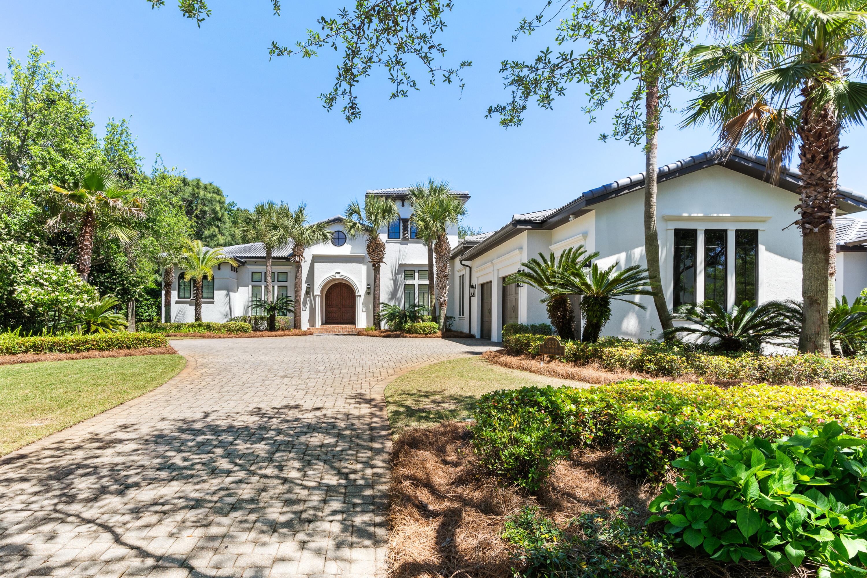 ONE STORY CUSTOM HOME ON THE GOLF COURSE AT BURNT PINE at SANDESTIN RESORT. UPGRADES GALORE IN THIS NEARLY 4,000 SQ. FT 3 BEDROOM 3.5 BATH HOME WITH STUDY INCLUDING OLD WORLD BRICK FLOORS, HIGH CEILINGS, ANTIQUE BEAMS, MAHOGANY FIREPLACE AND CROWN MOLDING. PERFECT ENTERTAINING HOME AS THE KITCHEN,BAR AREA,BREAKFAST NOOK, AND GREAT ROOM ALL OPEN UP TO EACH OTHER. GOURMET KITCHEN IS EQUIPPED WITH SUB ZERO REFRIGERATOR, WOLF 5 BURNER COOKTOP, DOUBLE STACKED OVENS,DUAL DISHWASHERS, WARMING DRAWER,AND PANTRY. SPECIAL DINING ROOM HAS 24 FOOT CEILINGS AND ANTIQUE FLOATING BEAMS, WINE GROTTO, AND CRYSTAL CHANDELIER. SEPERATE LIVING ROOM WITH FIREPLACE AND BEAMS OVERLOOKING THE LARGE OUTDOOR LIVING AREA, POOL AND GOLF COURSE. PRIVATE MASTER BEDROOM WITH HIS & HER BATH AND LARGE WALK IN CLOSET