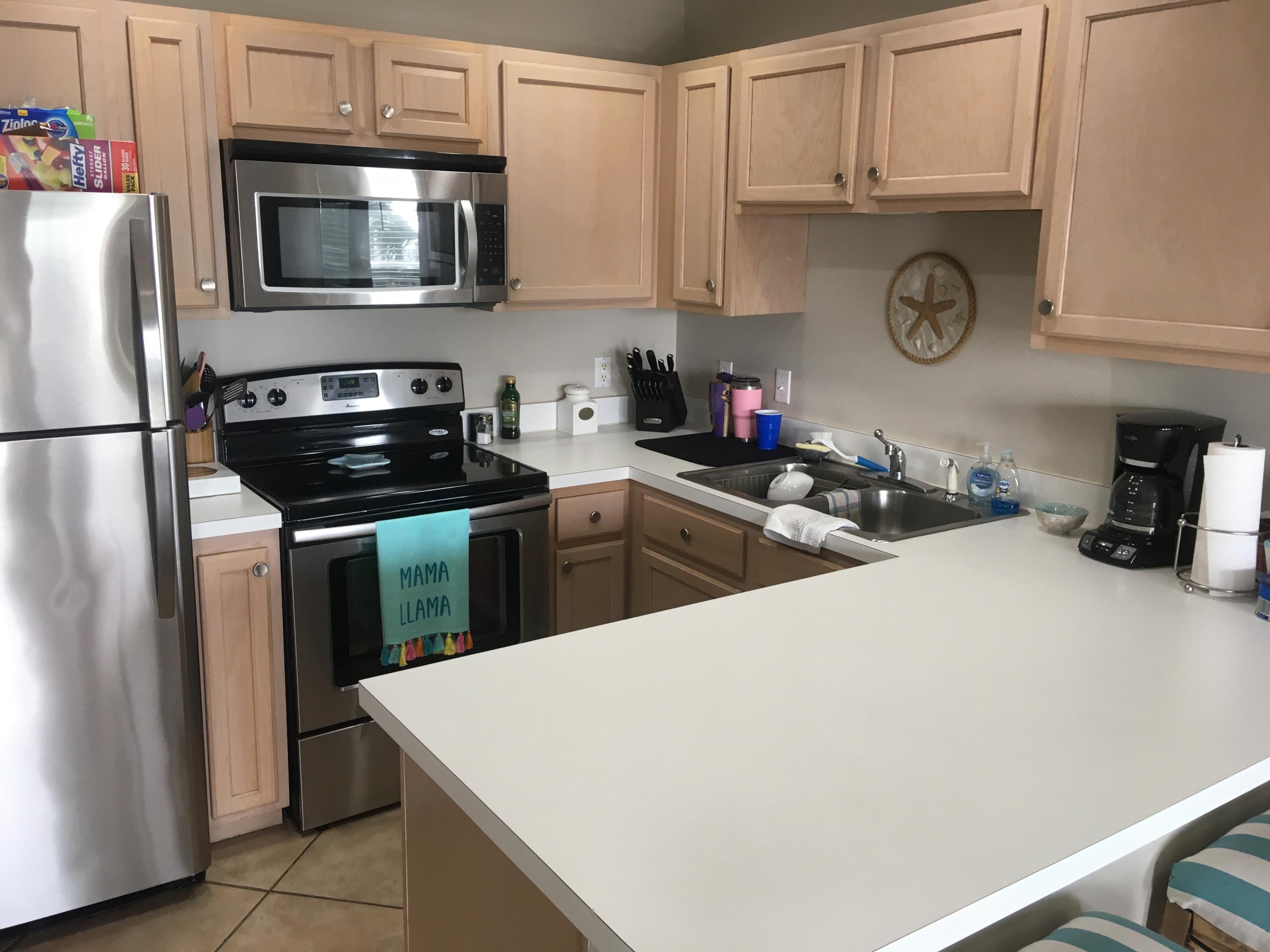 Enjoy the lovely view of the Gulf of Mexico from you private balcony. Just steps to the beach. Tile floor and stylish decor make this condo a great place to vacation or $$$ rent out. Bunks in hallway.   Open floor plan and fully furnished. Seasonally heated swimming pool, hot tub, and community grill. Located on the Scenic 98 bike path you can walk or ride bikes to many great restaurants and attractions. Buyer to verify all information.