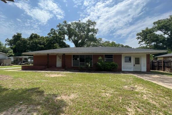 Built in 1960, this 3 bedroom 1 and 1/2 bath REO home is located on a flat level lot and close to military bases, PX, shopping, beaches and more. All brick exterior, this home has new dimensional shingled roof and tons of potential for both owner occupants and investors alike. Due to repairs needed, only cash or rehab loans only can be used for this purchase.