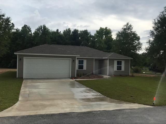 No skimping on Quality of this home built by Local Quality Builder that  
 is affordable  - Lot is almost 1/2 acre - level - wooded section in rear.  Solid wood Cabinetry, Granite Kitchen Counter tops.  ALL flooring Luxury, ''Lock & Lay'' vinyl.  Great floor plan with split bedroom plan, spacious guest bath, nice master bath with dual sink vanity, soaker tub as well as separate shower,  Nice Walk-in Closet, inside laundry.  Patio on Rear,    This is an energy efficient home  close in, but outside city limits so lower taxes.    Nice, neutral, popular decor.  Lot goes a good way back into wooded area.  Sod will be  front, 10' around sides and back.  Appliances will include a Micro-hood, Solid surface Range, self cleaning, and Dishwasher in Stainless Steel.  Completion date est.  5/31/21. Lawn will have a sprinkler system