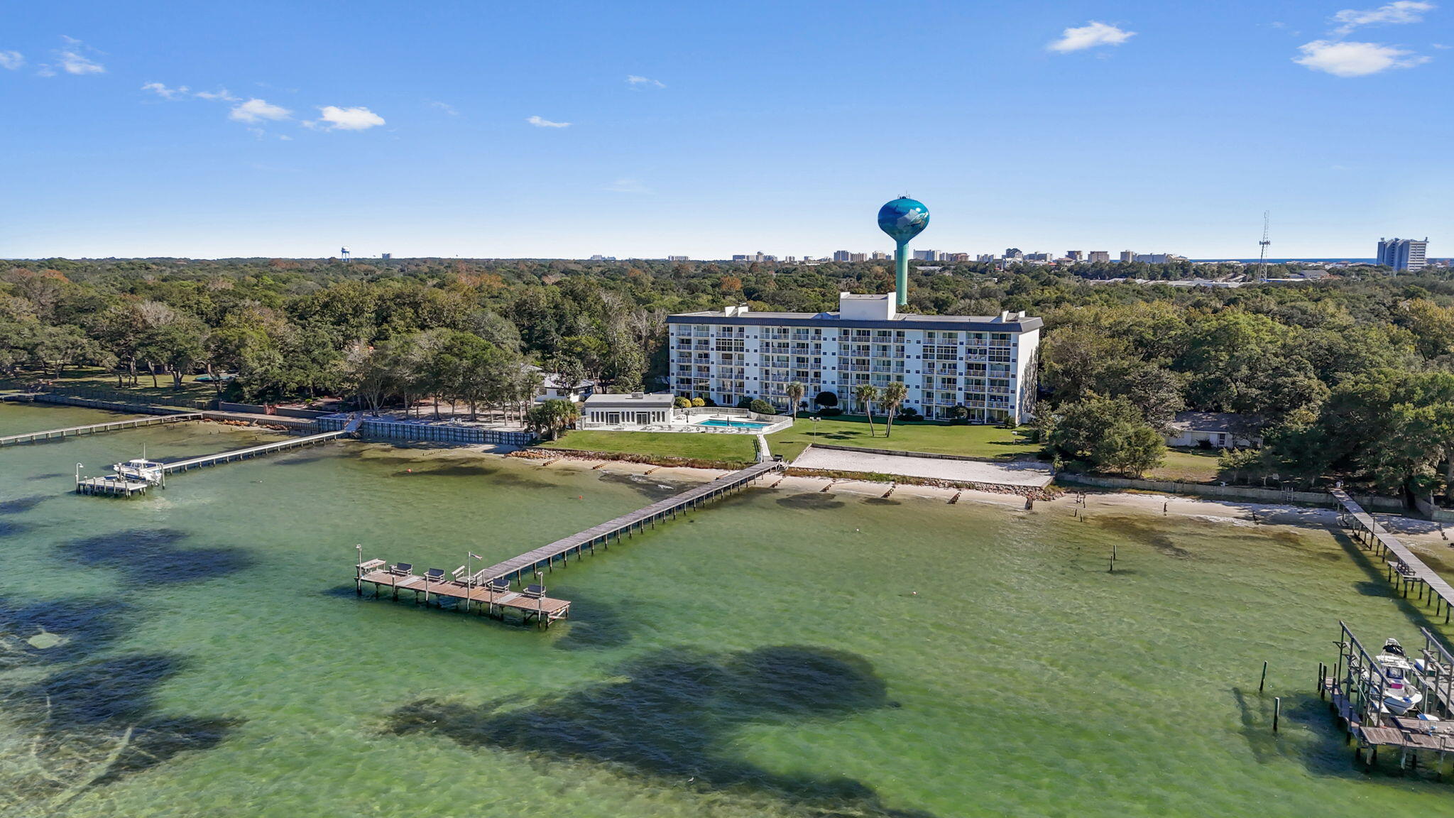 Encounter the perfect blend of comfort and style at 151 Calhoun Avenue, Unit 402, Destin, FL 32541. This beautifully designed 800 sq ft condo offers an inviting and spacious one-bedroom layout, ideal for a tranquil retreat. The open-concept living space is bathed in natural light, creating a warm and welcoming atmosphere that feels like home. Enjoy preparing meals in the modern kitchen, equipped with all the essentials for convenience and ease. The full bath is elegantly appointed, providing a serene space for relaxation and rejuvenation. Step onto your private balcony and savor the gentle breezes and stunning views that Destin is renowned for.