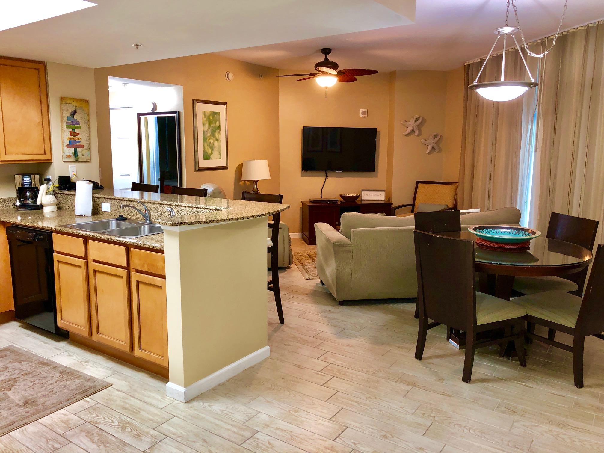 Full 2 bedroom inside corner unit. Seller just completed a light renovation and replaced all carpet with wood-look tile. All fans and TV's were recently replaced as well. Great views of 11,000 sq ft resort style pool. Other amenities include beach shuttle, tennis courts, basketball court, fitness center, and covered parking. Rental income has varied from $28,000-$32,000 depending on owner use.