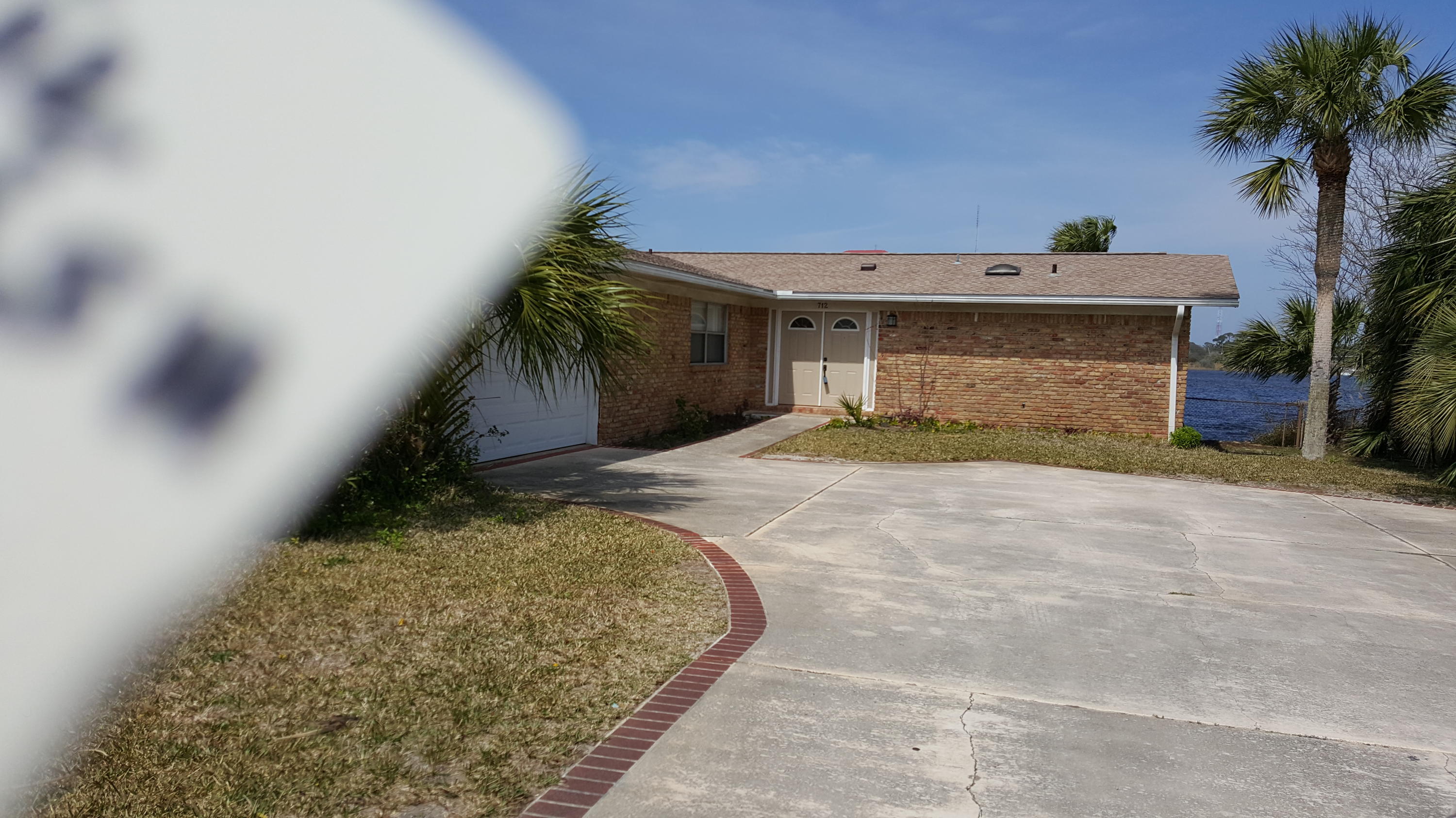 Waterfront home for sale and/or rent. Owner would like to sell home, however would rent it for a few years if needed. This home features a dock and lift with 88 ft seawall. Deck outside and a Florida room as well. Windows so as not to miss the action on the waterway. You will not want to miss this house. Please call today.