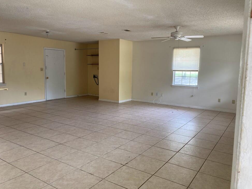 You will not want to miss out on this affordable unit in Crestview. Located right outside of downtown Crestview, this unit has everything you may need! There are appliances, and close enough to the business of the city without being in the South Crestview trafffic. Worried about spills or messes? There is tile throughout the living room, kitchen, and bathrooms, and only the home is only carpeted in the bedrooms!