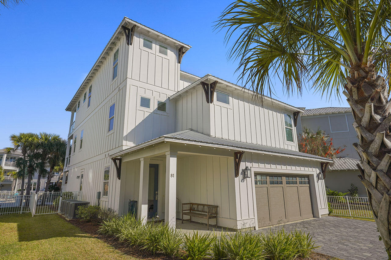 Experience 30A Coastal Luxury in the private, gated community of Cypress Breeze Plantation. This 3,699 SF custom-built Coastal Modern home offers 5 bedrooms, 4.5 bathrooms, a 2-car garage, and direct access to the community's resort-style pool—just minutes from Gulf Place and Ed Walline Beach Access. Designed for primary living, a second home, or a high-demand 30A vacation rental, this property is fully furnished and rental-ready with high-quality décor, linens, appliances, and turnkey features.

The first floor includes a complete Guest Suite with its own living area, gas fireplace, kitchenette (ice maker, drawer fridge/freezer, dishwasher), king bedroom, full bathroom, and private laundry room.  A back patio with a private gate provides immediate access to the resort-style community pool, allowing guests to enjoy poolside living without the maintenance.

The outdoor living area is ideal for entertaining, featuring a bar, grill, TV, and lounge seating, along with an included golf cart with charger and an infrared sauna.

On the second floor, an open-concept layout connects the family room, dining area, and chef's kitchen. Retractable glass sliders lead to a spacious covered porch with a Big Green Egg. The kitchen offers high-end features including Thor stainless-steel appliances, European flat-panel cabinetry, quartzite countertops, a gas stove/oven, and a large island breakfast bar. The luxurious primary suite includes two walk-in closets and a spa-style bathroom with a soaking tub, double vanities, and a walk-in shower. A half bath is also located on this level.

The third floor provides three additional bedrooms, two with private balcony access and unique porch swings overlooking the pool. Two full bathrooms and a second laundry room complete this level, offering convenience for guests and larger groups.

Built with high-impact-rated walls, windows, and doors, the home also features spray foam attic insulation, three Trane HVAC systems, and tankless gas water heaters for efficiency and durability.

Located less than a mile from 30A's white-sand beaches, this property offers easy access by walking, biking, or golf cart. Enjoy the best of 30A West, including Gulf Place Town Center, Shunk Gulley Oyster Bar, boutiques, live music, dining, and entertainment.

With its modern design, rental-ready setup, and prime location near the beach, shops, and dining, this Cypress Breeze Plantation home presents an exceptional opportunity for 30A living or investment.