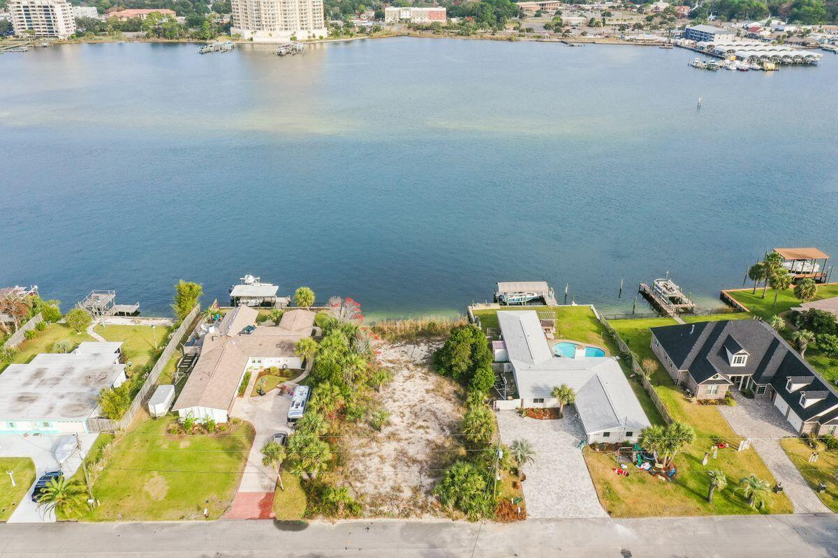 LARGE DEEP WATER LOT with gorgeous views on Okaloosa Island.  Enjoy 80 Feet of waterfront property overlooking the Intracoastal Waterway with a sea wall already in place!  The majority of this lot lies in Flood Zone X and you are only 800 feet away from the public beach access....this is the perfect location to build your primary residence or dream vacation home!