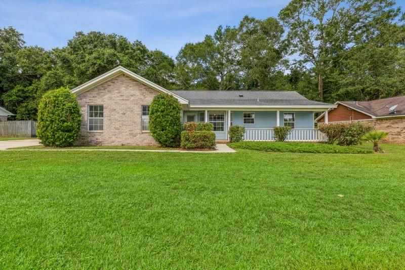 UNDER CONTRACT AND TAKING BACK UP OFFERS Freshly painted and deep cleaned with new carpets throughout entire home. This property has 150 deep irrigation well, pump and tank. Also a 30 AMP RV hookup. Split floor plan and Fireplace. The home has a large covered back patio and large front porch. Lot is large and completely flat and backs up into woods and is full fenced with a chain link fence. The home is located on a no outlet so very little traffic comes through. Convenient to the HWY 90 Shopping Corridor and less than 15 minutes to the interstate. Pace Schools