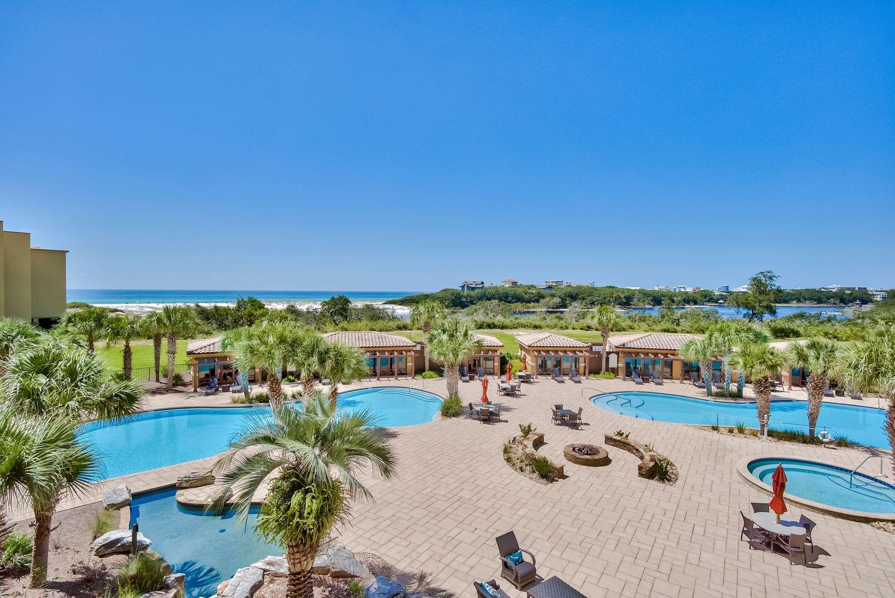 Offering an ideal location in Blue Mountain Beach, this luxury resort condo provides 3,451 square feet of living space, elegant finishes, and desirable on-site amenities. With unparalleled facilities, features and comforts, this well-maintained condo has been refreshed with new paint, updated light fixtures, and new stone work in the main living area, bar counter and kitchen. This sprawling, single-level unit offers plenty of room as a primary or secondary residence with four bedrooms, a dedicated media room with a surround sound system, and office space. Two bedrooms are large enough to be owner's suites, and one features a luxurious spa with Whirlpool bathtub and ceiling-to-floor stone steam shower. Prepare meals in a gourmet kitchen with Viking appliances and granite countertops. A separate bar area with its own ice maker is a perfect place for mixing cocktails. Relax in the open living area or on the large private balcony with serene views of the Gulf of Mexico and Big Redfish Lake. Tucked in Sanctuary by the Sea, residents of this gated beach community enjoy several exquisite amenities, including beautifully decorated sitting areas, an impressive atrium, three large pools, fire pits, two jacuzzis, and grilling areas. An owner's clubhouse includes a full kitchen, theater room, virtual golf, and a state-of-the-art fitness center. Sanctuary by the Sea also offers 24 hour security with a guard-manned entry gate allow for utmost privacy and safety. 82 units take advantage of direct access to 650 feet of sprawling and pristine private beach while access to Big Redfish Lake allows for fishing from the community pier, paddle boarding, kayaking, and other water activities offering the best of life on the coast.