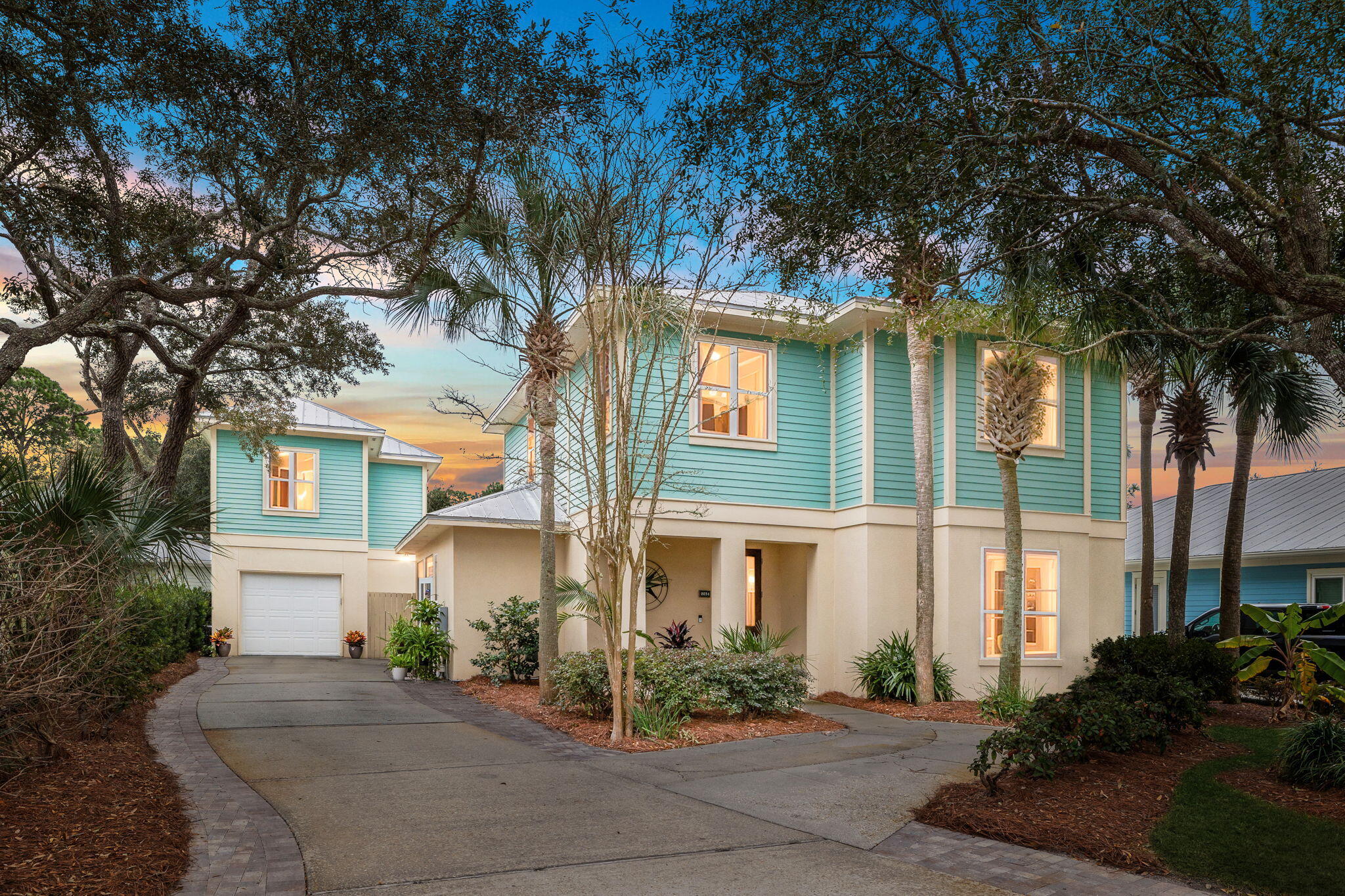 NEW ROOF scheduled for JUNE install!! Nestled within the exclusive Crystal Lake community of the renowned Sandestin Golf and Beach Resort, this stunning, spacious retreat, complete with a carriage house, offers the perfect blend of comfort, luxury, and style. This 5-bedroom, 5.5-bathroom oasis perfectly marries modern elegance with laid-back coastal charm, offering a lifestyle that's as vibrant as its surroundings. This spacious retreat combines luxury, comfort, and timeless style, offering a lifestyle as inviting and dynamic as the charming resort community it calls home. Step inside, and you're greeted by a bright, open-concept living space that feels effortlessly inviting. The seamless flow between the living room, dining area, and kitchen creates a harmonious space designed for both everyday comfort and effortless entertaining. Sunlight beams through brand-new plantation shutters, casting a warm glow across the thoughtfully updated interiors.

The heart of this home is the newly refreshed kitchen - a chef's dream. Featuring sleek quartz countertops, a gas stove, and a convenient beverage center, it's as practical as it is stylish. Whether you're whipping up a casual breakfast or hosting a dinner party, this space is sure to inspire. On the main level, a flexible bedroom with an en-suite bathroom offers endless possibilities use it as a cozy guest suite, a dedicated home office, or simply a quiet retreat. Every detail throughout the home has been carefully considered, ensuring a perfect balance of sophistication and functionality.

Adjacent to the living area, you'll find a large screened-in porch, offering a tranquil spot to unwind and take in the beauty of the outdoors, no matter the season. The home features oversized bedrooms, bathrooms, and a carriage house, all thoughtfully designed to provide ample space and ultimate comfort. Upstairs, two spacious, sunlit guest rooms with built in closets await, along with the inviting master bedroom. The master bathroom is a serene retreat, complete with a large soaking tub, a walk-in shower, and a generous walk-in closet outfitted with built ins. The bathrooms throughout the home have been tastefully updated with upgraded tile showers and sleek glass doors, lending a modern edge to the home's timeless charm. This residence masterfully balances functionality and luxury, creating an atmosphere that feels both refined and welcoming.

Outside, the property shines just as brightly. A long, extended driveway, flanked by lush, mature landscaping and additional pavers, ensures parking is effortless while adding to the home's striking curb appeal. Boasting the neighborhood's LARGEST FLOOR PLAN, this home also includes a separate oversized carriage house above the heated and cooled garage. This unique carriage house and garage boasts not one but two fully equipped kitchens, a convenient laundry area, and two full bathrooms, making it a versatile haven ready to accommodate your every need. The fenced, private backyard is a true oasis, perfect for hosting outdoor gatherings, playing with pets, or simply enjoying a peaceful retreat.

Whether you're drawn to its spacious interiors, luxury updates, or the abundance of outdoor living options, this property truly has something for everyone.

Imagine living in a place where every day feels like a vacation. This vibrant coastal destination is more than just a community; it's a lifestyle. Here, you can hop on your golf cart and cruise to charming boutiques and retail shops, making errands feel like a leisurely outing. Foodies will be in heaven with an array of dining options, from laid-back beachside cafes to upscale restaurants serving exquisite cuisine to satisfy every craving.

For adventure seekers, the nearby Baytowne Marina is your gateway to endless water fun , whether it's kayaking, paddleboarding, or jet skiing on the sparkling coastal waters. If staying active is your thing, you'll love the scenic walking and biking trails that wind through the community, along with state-of-the-art fitness centers and, of course, world-class golf courses that will impress even the most seasoned players.

This is Sandestin: a place where relaxation, recreation, and luxury effortlessly come together. It's not just a home it's the ultimate Florida lifestyle.

Ready to experience coastal living at its finest? 2031 Pine Island Circle awaits you.