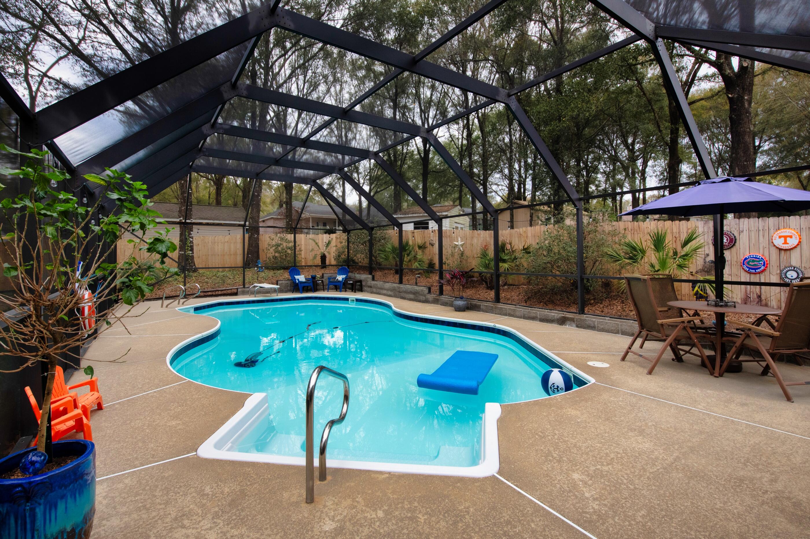 CRESTVIEW POOL HOME WITH IT'S OWN BACKYARD TROPICAL OASIS IS NOW AVAILABLE!  

Welcome to 2412 Mill Run Drive! This impressive 2-story home is meticulously maintained and features 4 bedrooms, 2 baths, and a SPARKLING ENCLOSED POOL!

Enter the home through a solid wood door, with stained glass accents! The living room is spacious and boasts cathedral ceilings, a wood-burning fireplace and stained glass window. 

 The DELUXE-SIZED KITCHEN is well-appointed, with NEW BLACK STAINLESS REFRIGERATOR AND DISHWASHER... GORGEOUS IMPORTED GRANITE COUNTERS... OAK CABINETRY WITH COUNTERTOP LIGHTING... and a PLANT WINDOW!  Fresh grown herbs anyone? 

Coffee addicts will appreciate the extra counter space for a designated coffee bar. There's also designated dining space, and a small outdoor patio area for those who prefer dining outside. 

The MASTER SUITE is its own PRIVATE RETREAT with French doors leading out to the enclosed pool. 

All remaining bedrooms are upstairs.  Each one is spacious, with wood laminate flooring... roomy closets... and large windows that flood the rooms with natural light.

CURB APPEAL?  Absolutely! You will find thoughtful landscaping design in the front of the home and back. There's also a spacious shed for all gardening tools and equipment.. as well as separate pool equipment storage.  

As previously mentioned, this pool is SPARKLING courtesy of meticulous owners! IT ALSO COMES WITH A DIVING BOARD! Who's ready for the next pool party? 

BONUS...County Taxes, and quick commute to bases! Make your appointment today.