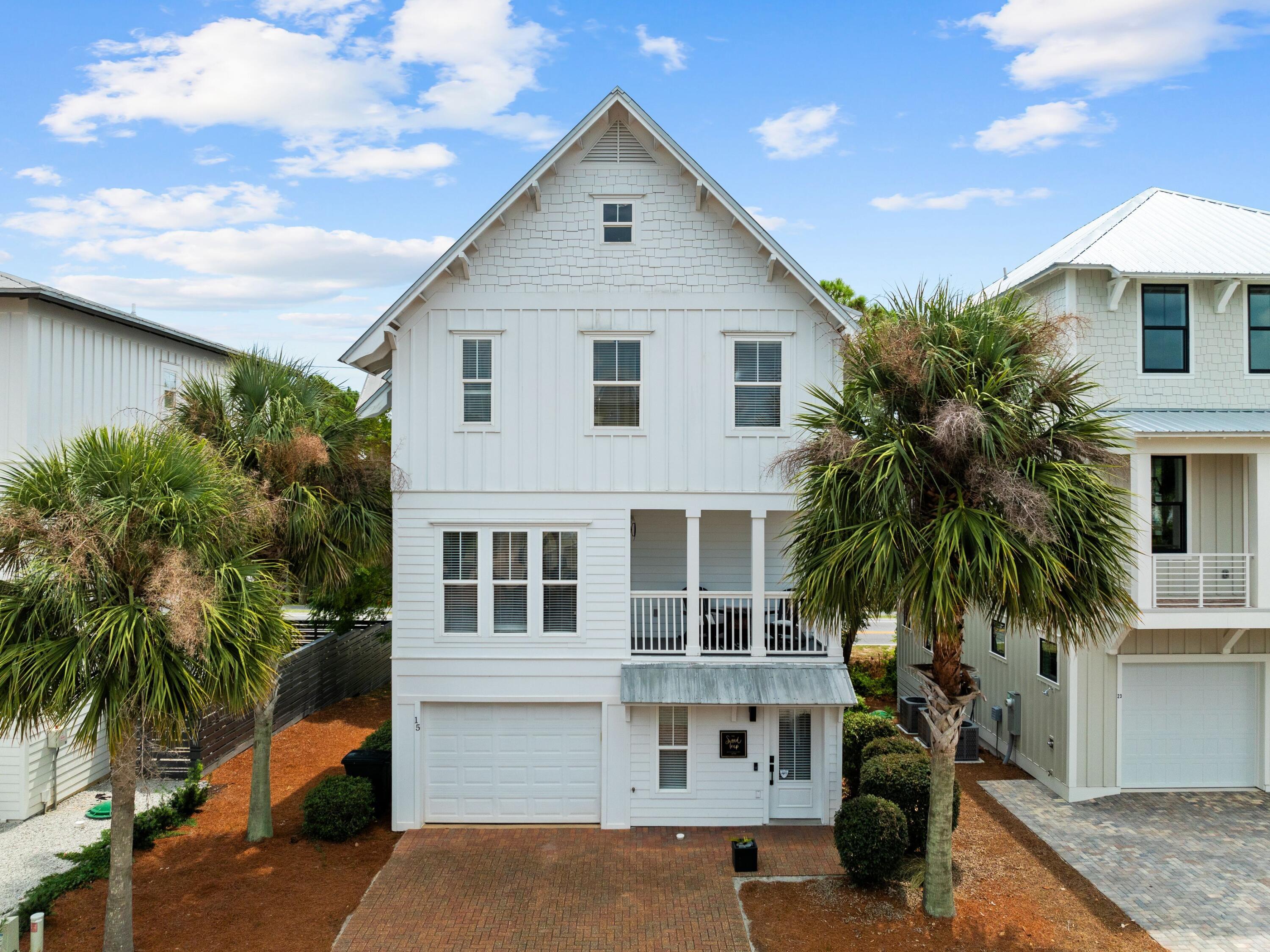 This remodeled Florida cottage sits directly on Scenic Highway 30A, just one block from the beach and a short walk to Gulf Place shops and restaurants. The home features a reverse floor plan with the main living space upstairs, including an open kitchen with granite countertops, stainless steel appliances, and white cabinetry. The second floor also offers a dining area, two balconies, and plenty of space for relaxing or entertaining. Recent updates include new flooring, fixtures, and fresh paint throughout. Whether you're looking for a primary residence or a vacation home, this property combines convenience, comfort, and a prime location near the beach.